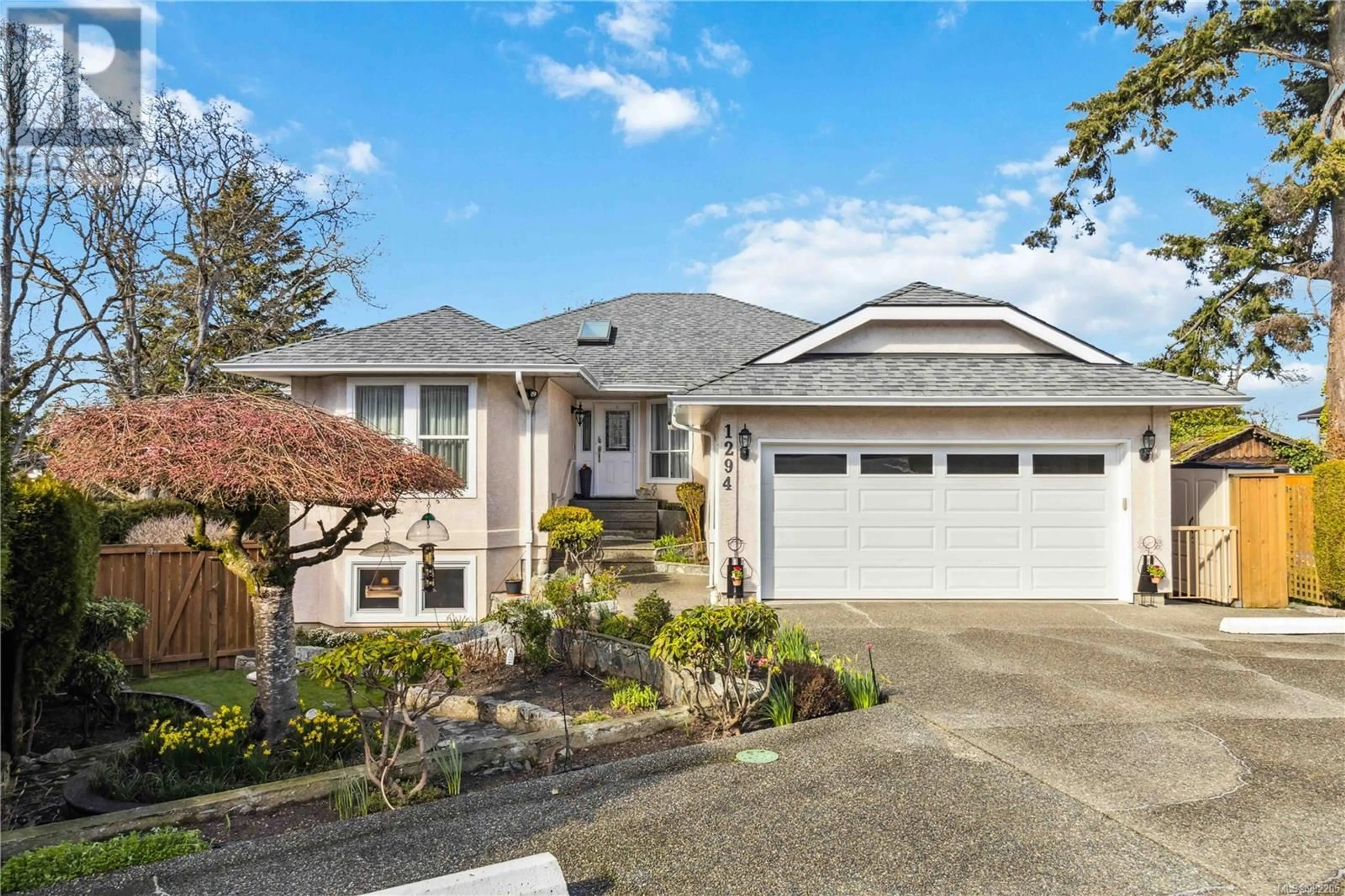 Home with vinyl exterior material, street for 1294 CARMICHAEL COURT, Saanich British Columbia V8Z7B9