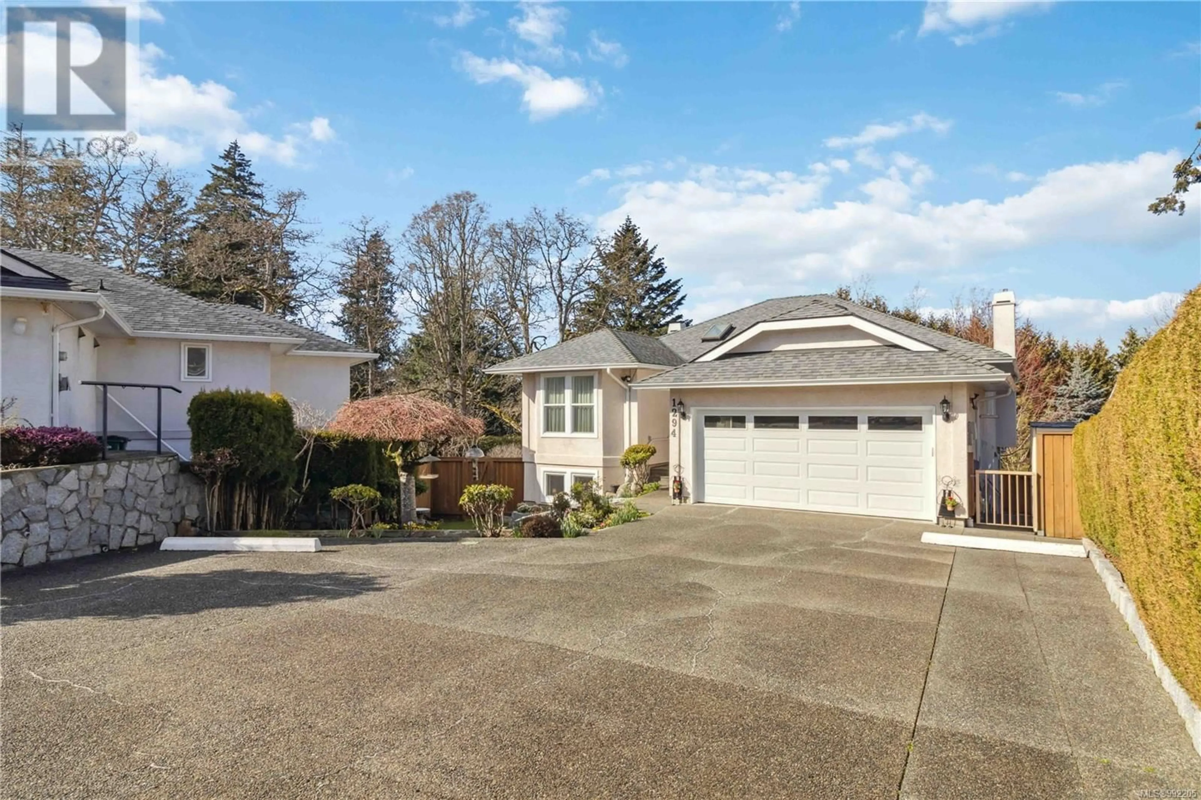 Home with vinyl exterior material, street for 1294 CARMICHAEL COURT, Saanich British Columbia V8Z7B9