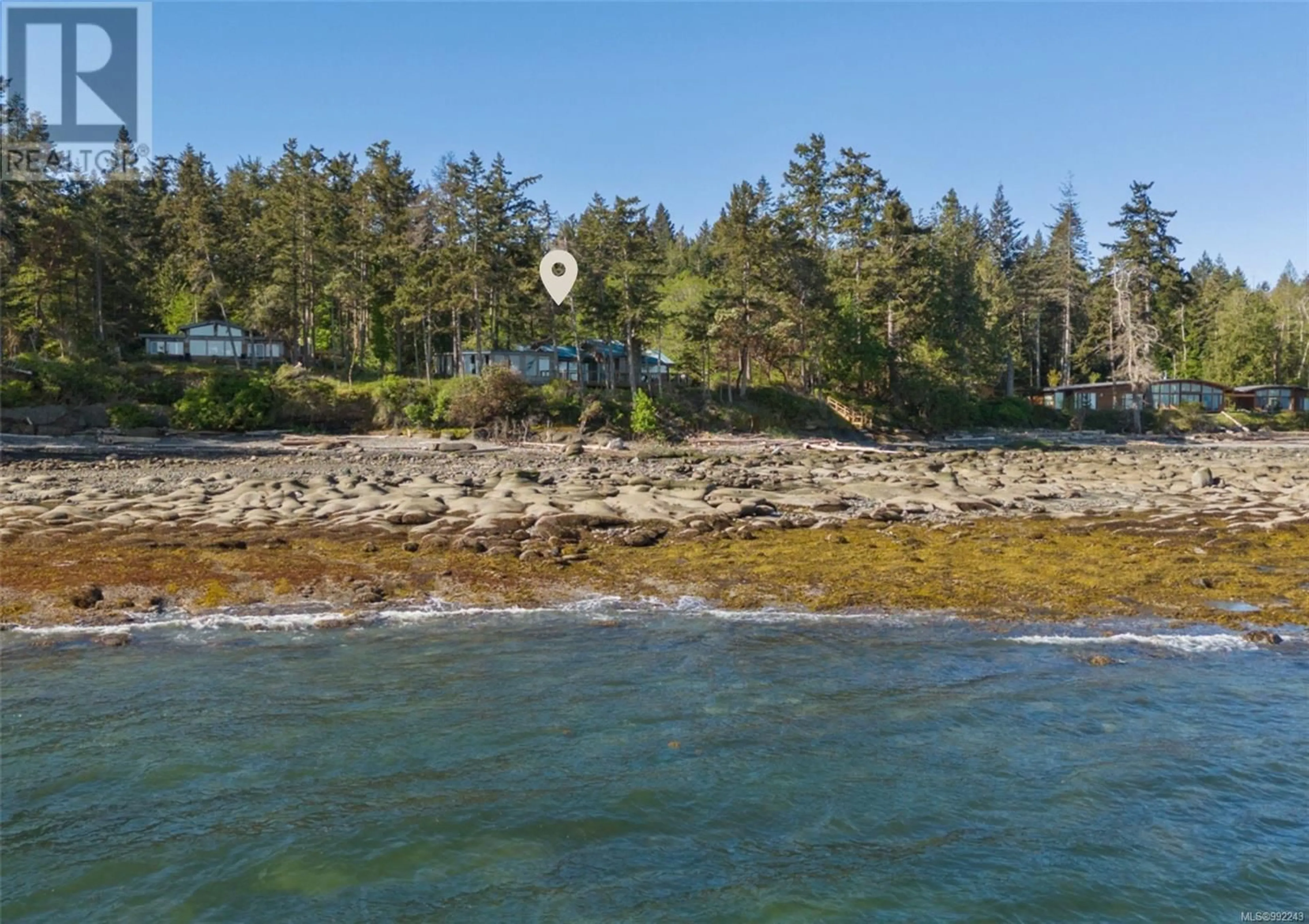 A pic from outside/outdoor area/front of a property/back of a property/a pic from drone, water/lake/river/ocean view for 6055 MACLEAN ROAD, Hornby Island British Columbia V0R1Z0