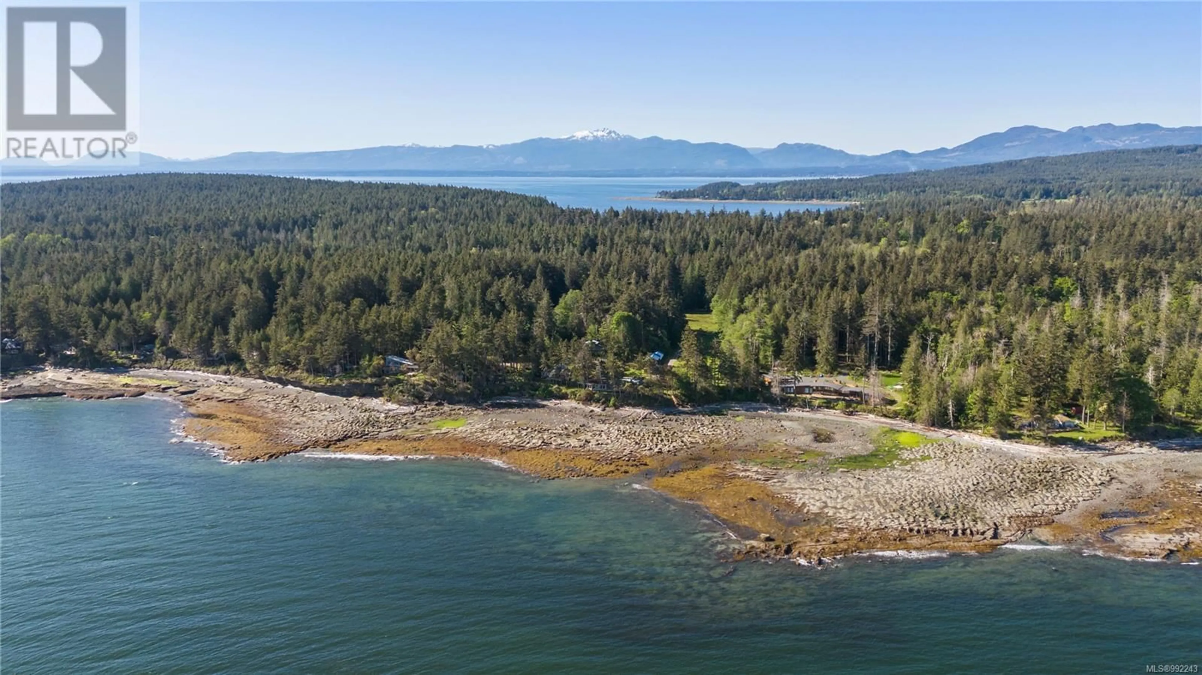 A pic from outside/outdoor area/front of a property/back of a property/a pic from drone, water/lake/river/ocean view for 6055 MACLEAN ROAD, Hornby Island British Columbia V0R1Z0