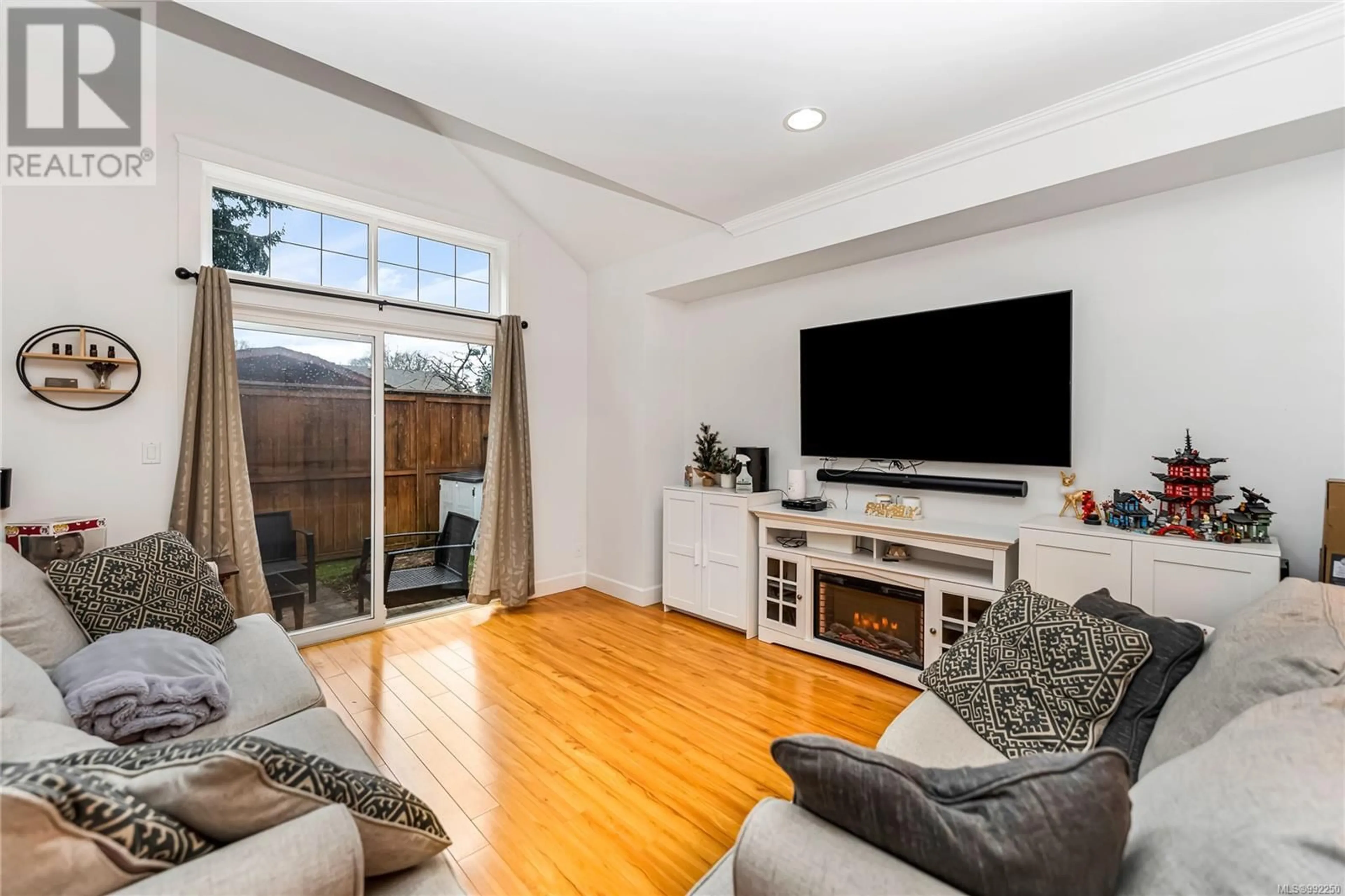 Living room with furniture, wood/laminate floor for 19 - 2210 SOOKE ROAD, Colwood British Columbia V9B0E4