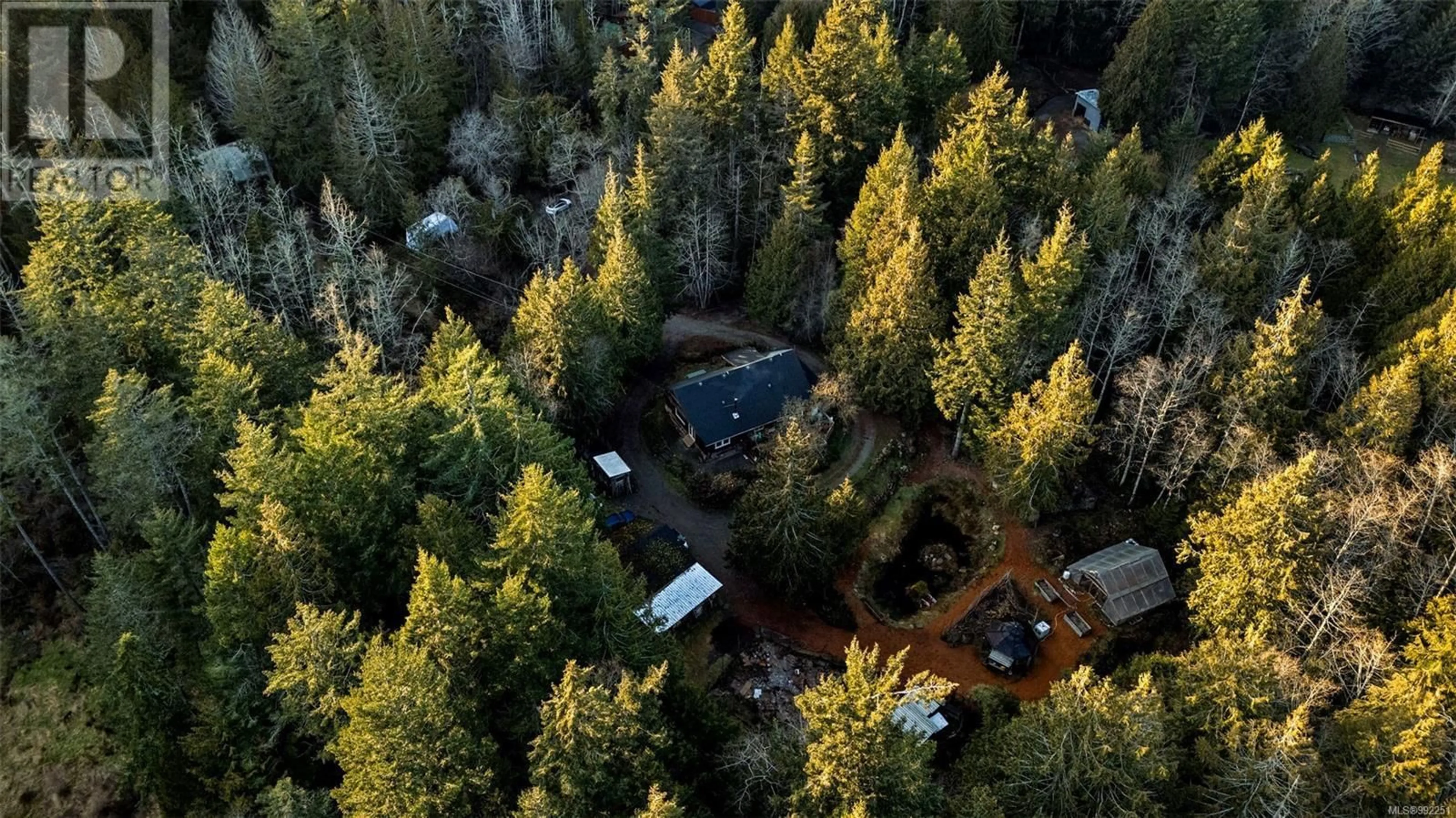 A pic from outside/outdoor area/front of a property/back of a property/a pic from drone, forest/trees view for 2993 ROBINSON ROAD, Sooke British Columbia V9Z0J9