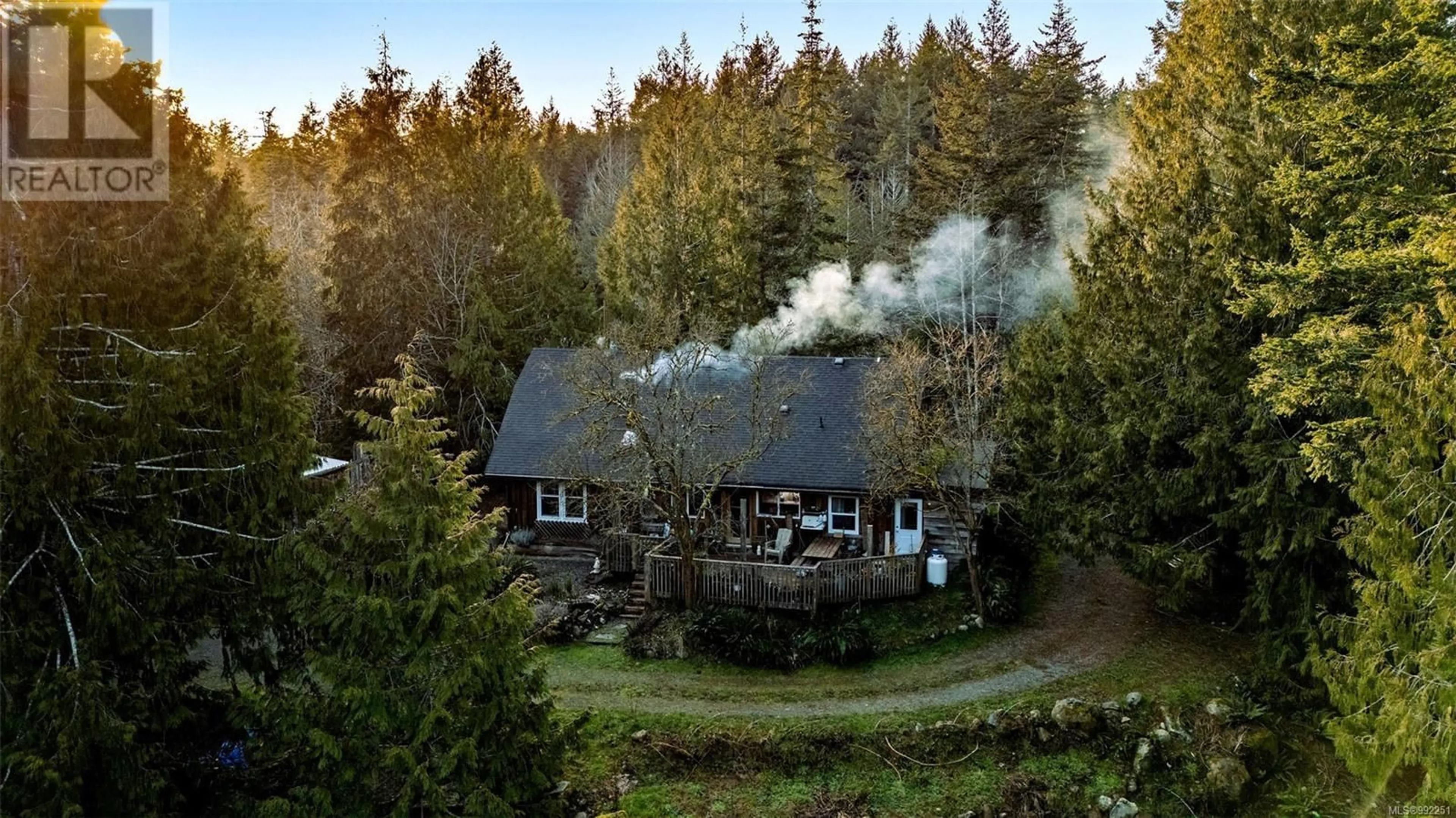 A pic from outside/outdoor area/front of a property/back of a property/a pic from drone, forest/trees view for 2993 ROBINSON ROAD, Sooke British Columbia V9Z0J9