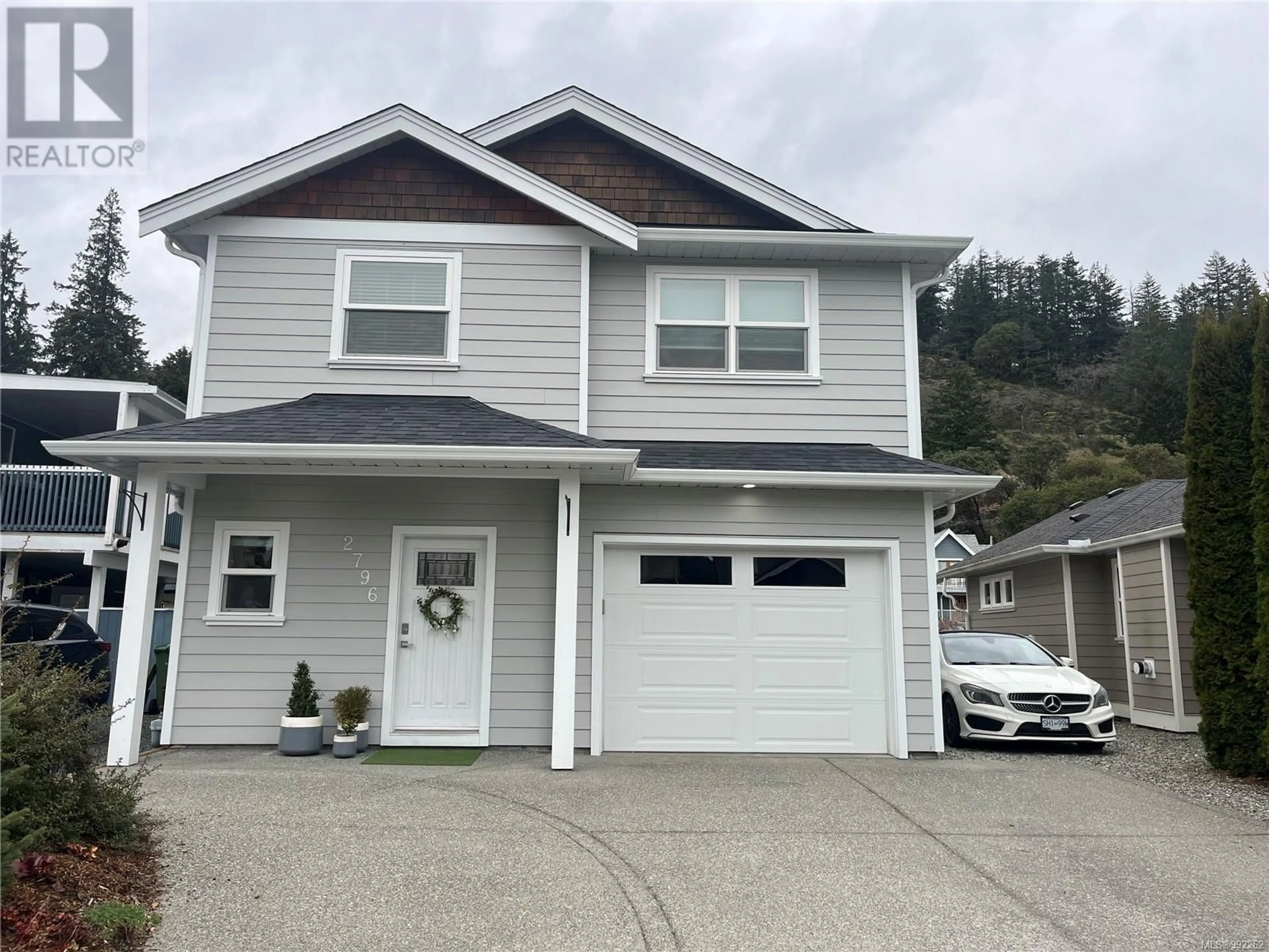 Home with vinyl exterior material, street for 2796 LAKE END ROAD, Langford British Columbia V9B5T5
