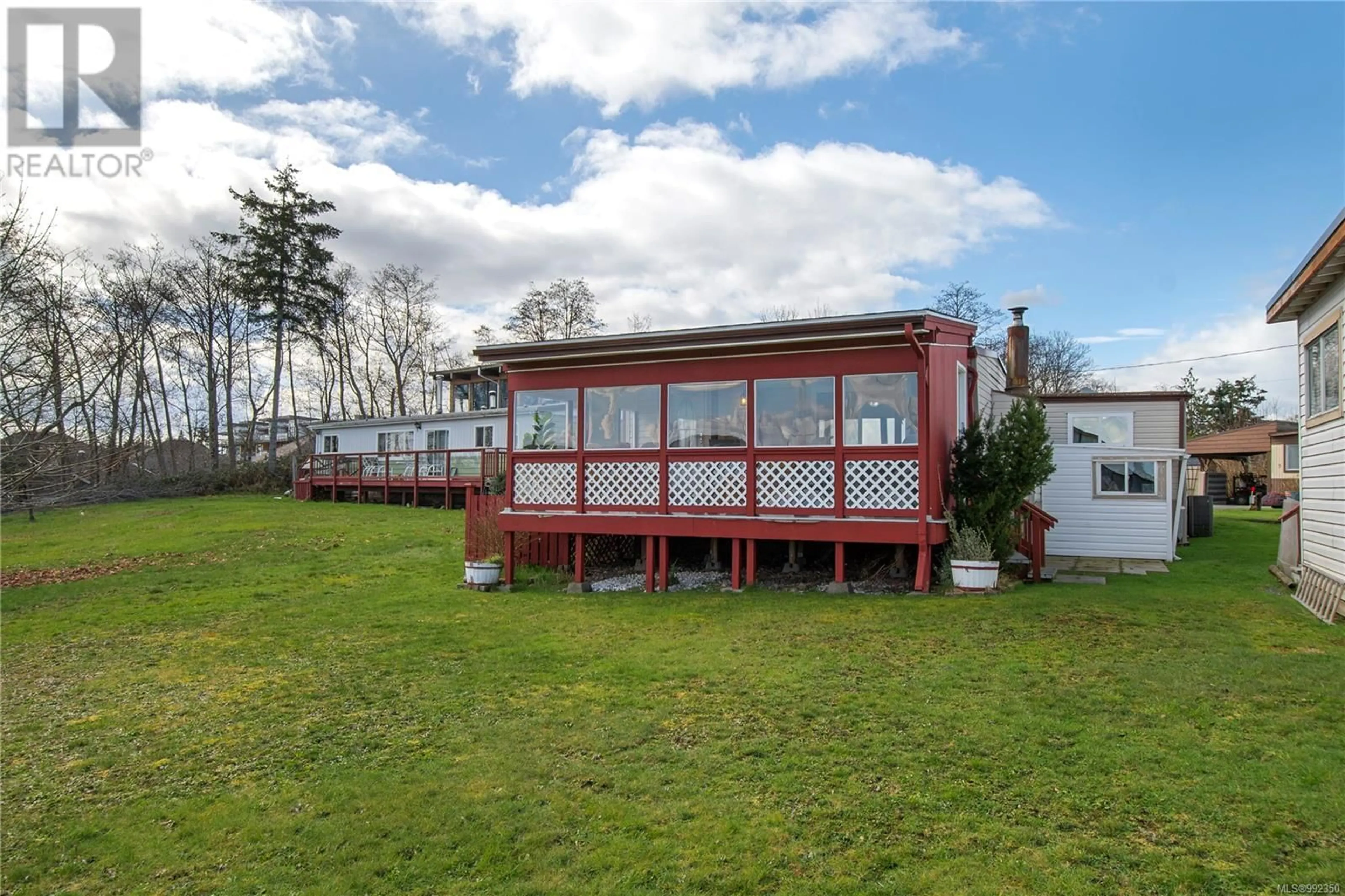 A pic from outside/outdoor area/front of a property/back of a property/a pic from drone, building for 2 - 1451 PERKINS ROAD, Campbell River British Columbia V9W4R8