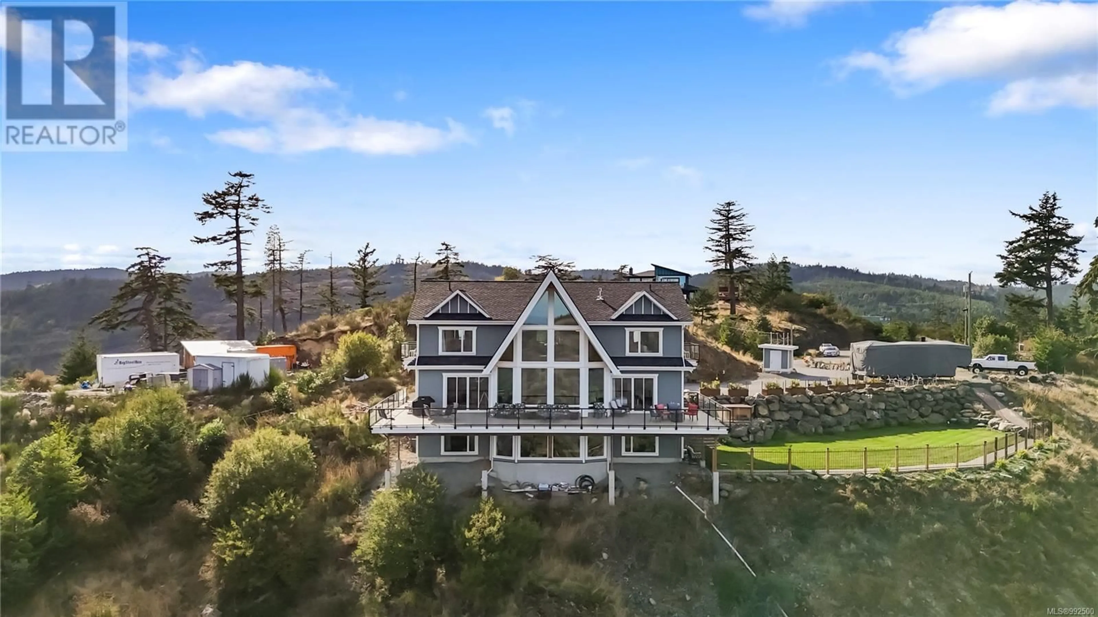 A pic from outside/outdoor area/front of a property/back of a property/a pic from drone, water/lake/river/ocean view for 4120 RIDGELINE DRIVE, Shawnigan Lake British Columbia V8H2J1