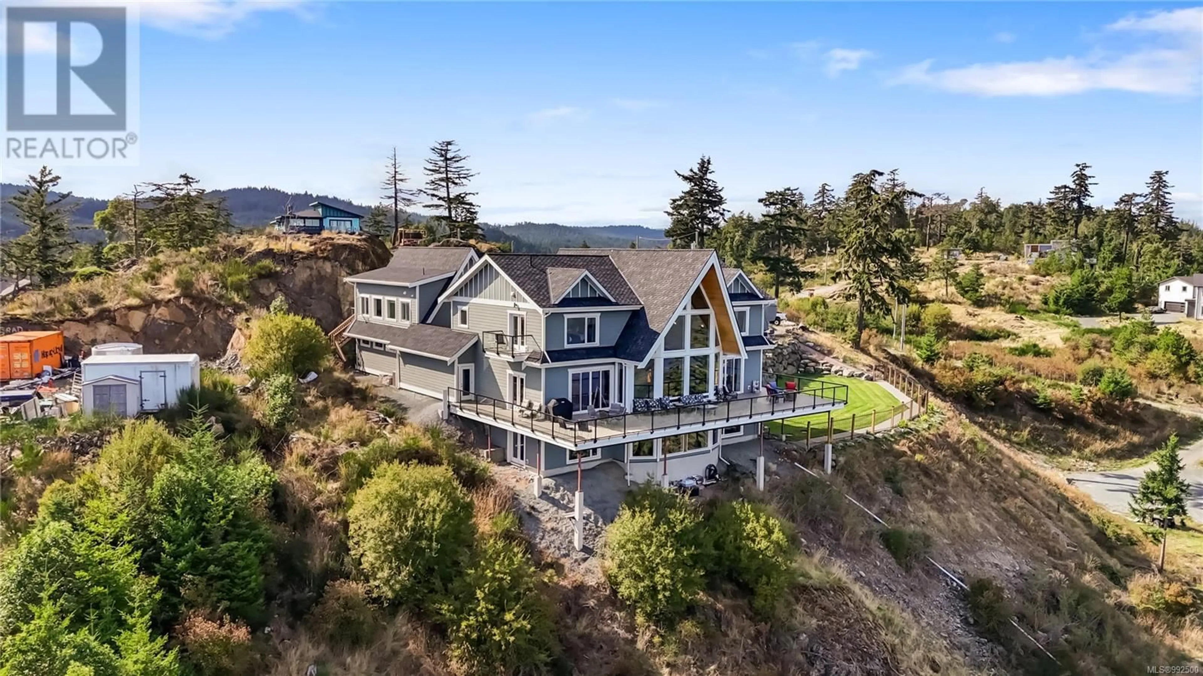 A pic from outside/outdoor area/front of a property/back of a property/a pic from drone, water/lake/river/ocean view for 4120 RIDGELINE DRIVE, Shawnigan Lake British Columbia V8H2J1