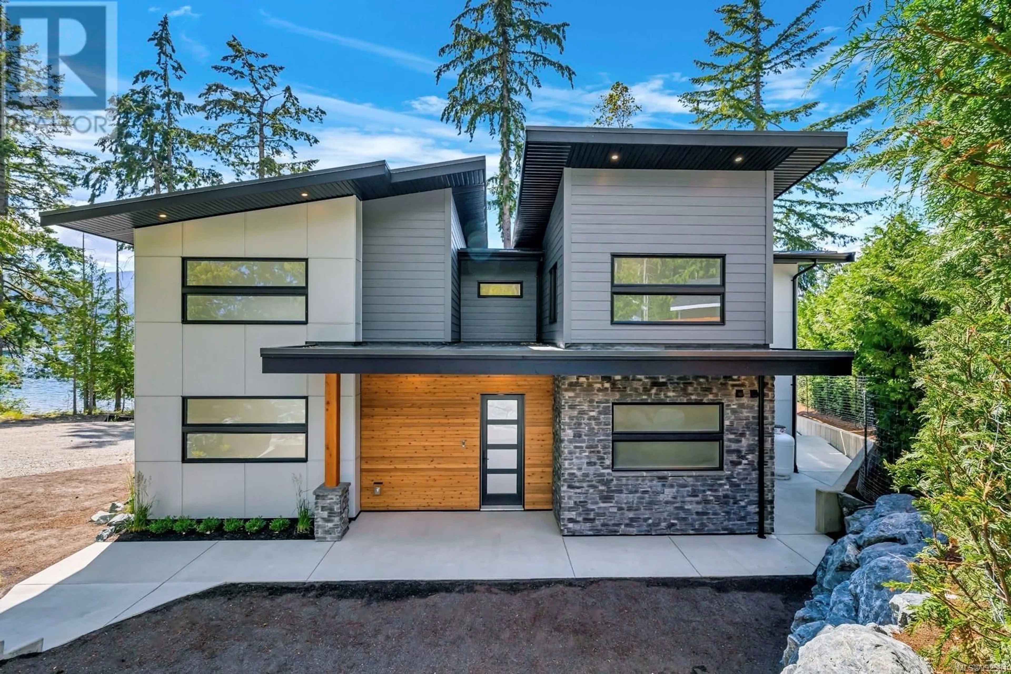 Home with vinyl exterior material, street for 8394 SA-SEEN-OS ROAD, Youbou British Columbia V0R3E1