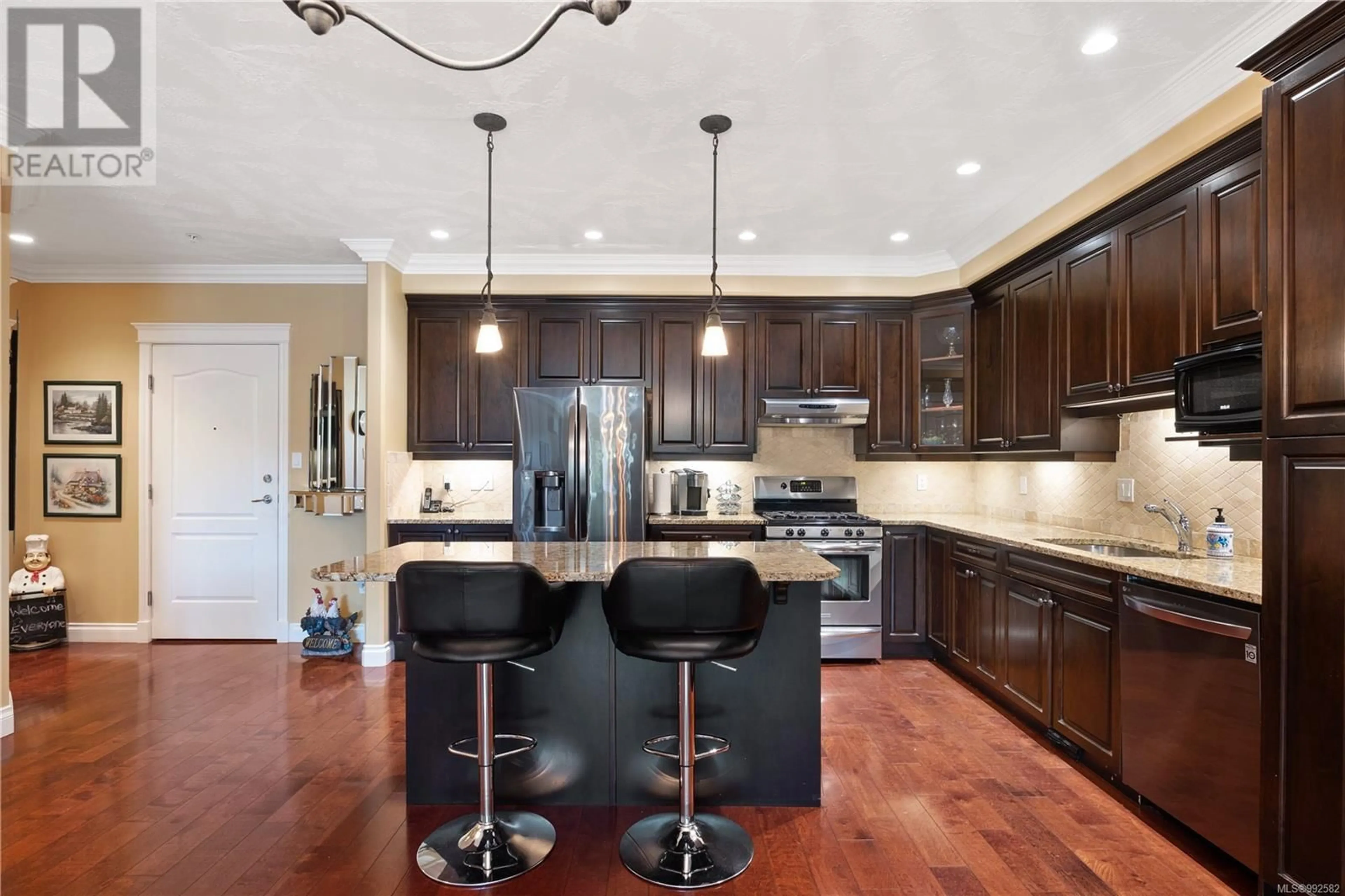 Contemporary kitchen, ceramic/tile floor for 415 - 3666 ROYAL VISTA WAY, Courtenay British Columbia V9N9X8