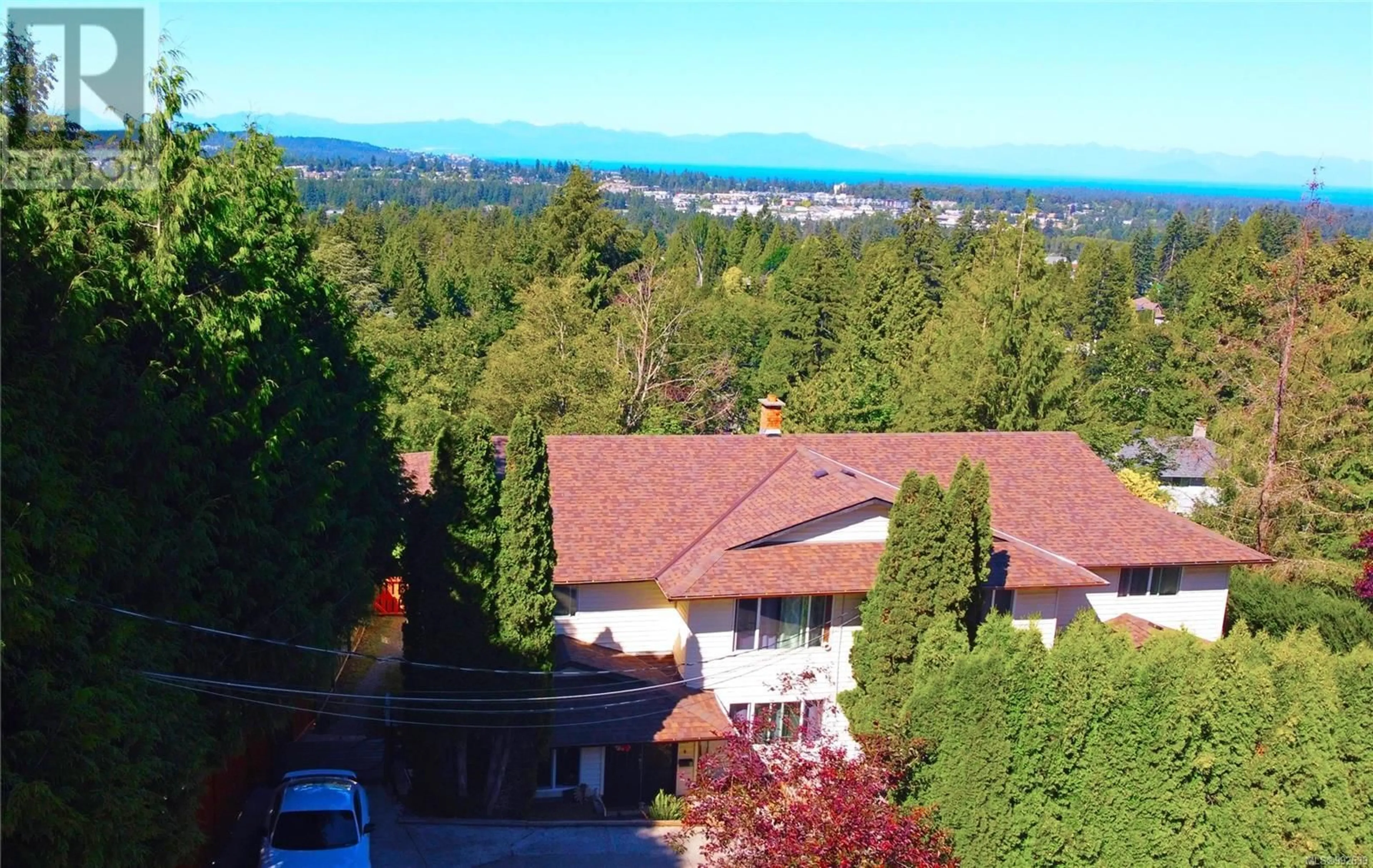 A pic from outside/outdoor area/front of a property/back of a property/a pic from drone, mountain view for 2326 PANORAMA VIEW DRIVE, Nanaimo British Columbia V9R6T1