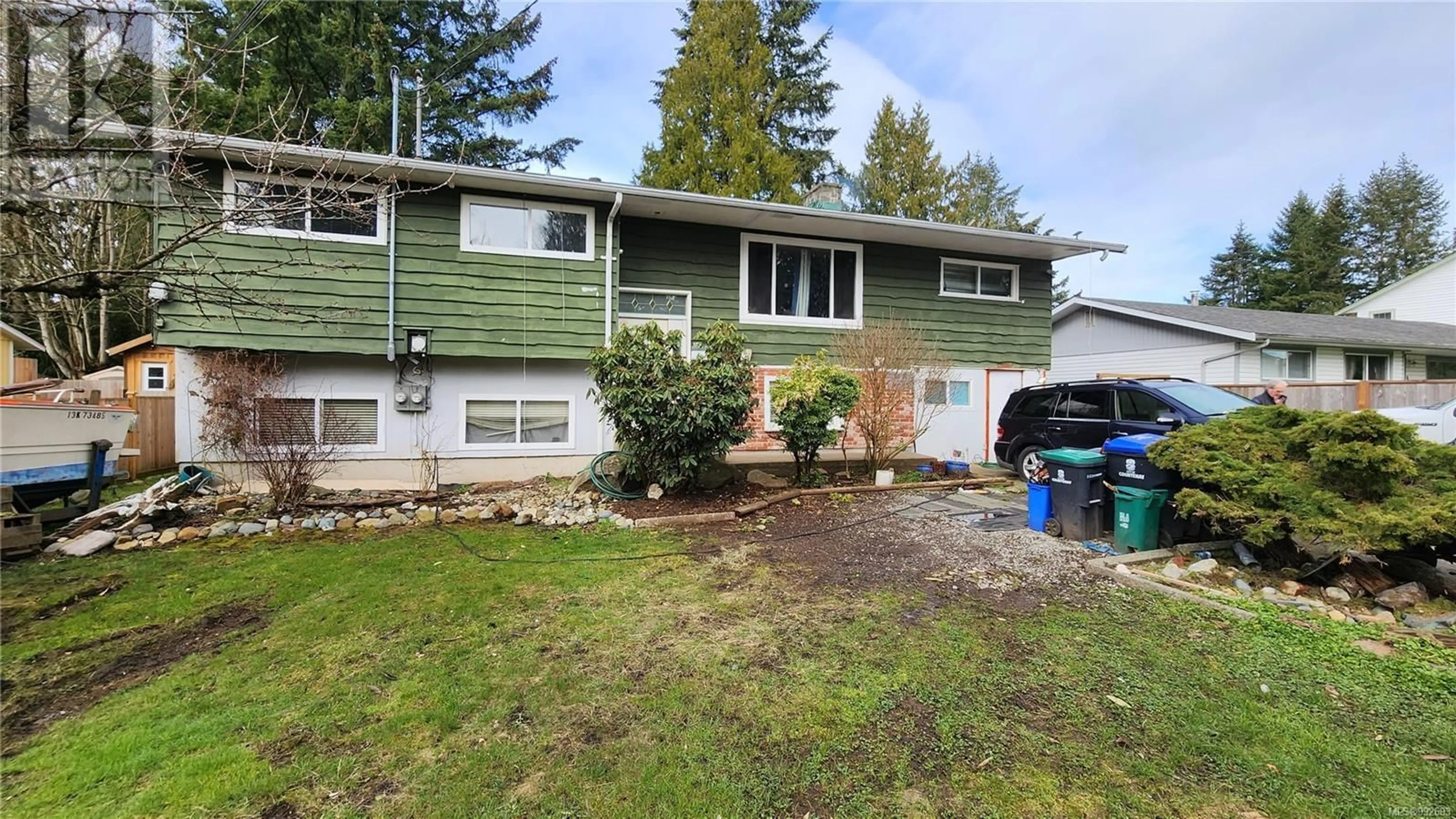 Home with vinyl exterior material, street for 1561 TULL AVENUE, Courtenay British Columbia V9N3J4