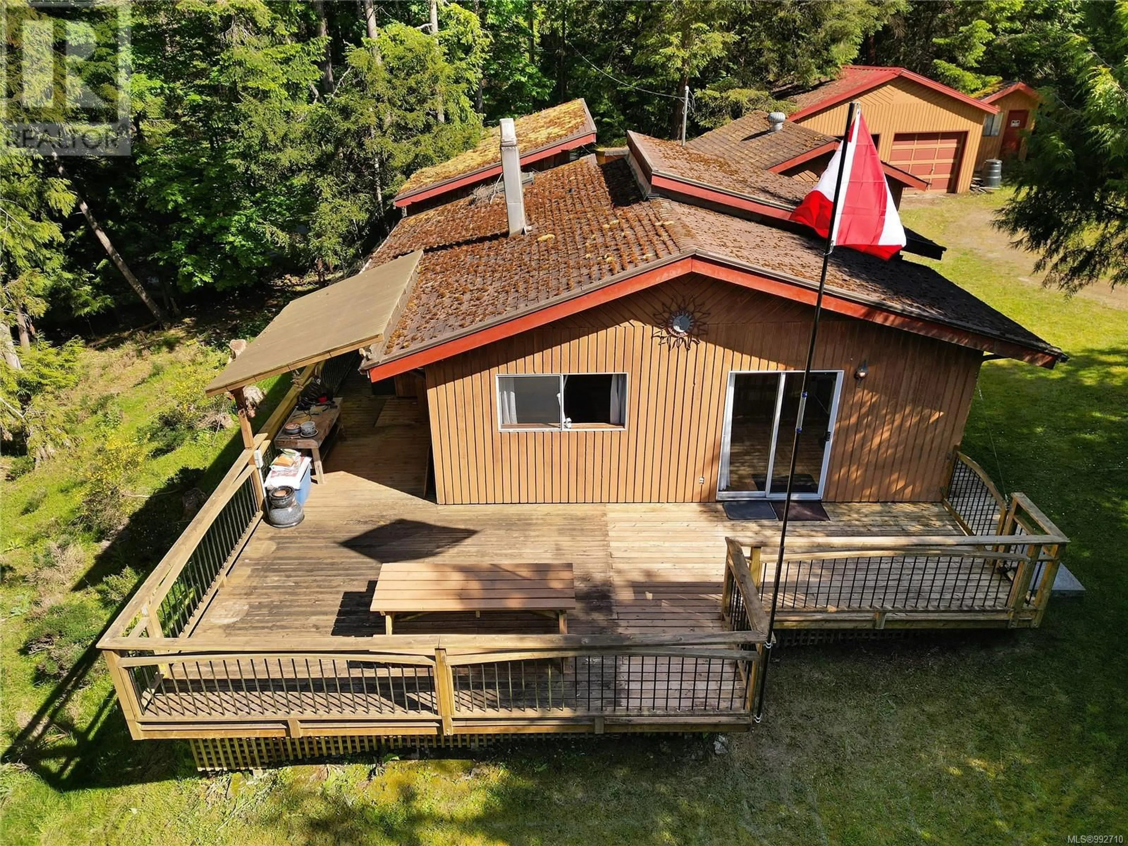 A pic from outside/outdoor area/front of a property/back of a property/a pic from drone, building for 212 CHERRY TREE LANE, Mayne Island British Columbia V0N2J1