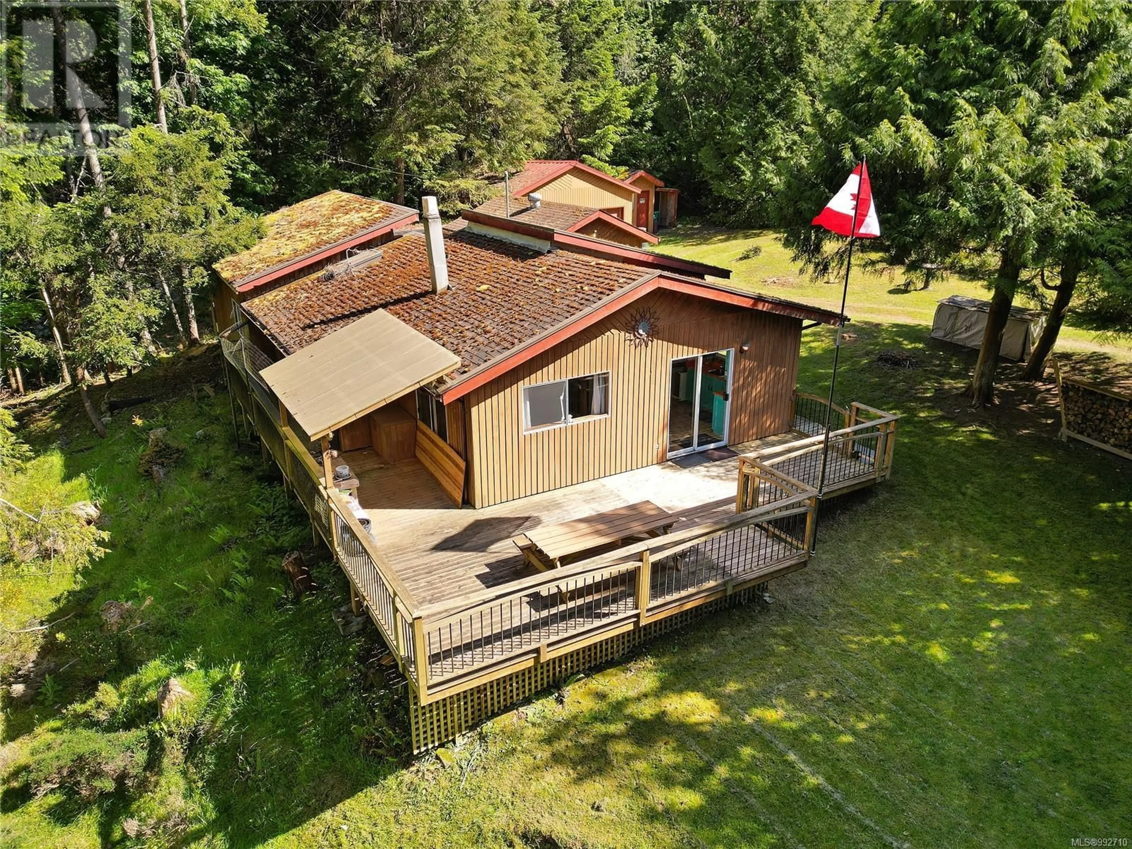 A pic from outside/outdoor area/front of a property/back of a property/a pic from drone, unknown for 212 CHERRY TREE LANE, Mayne Island British Columbia V0N2J1