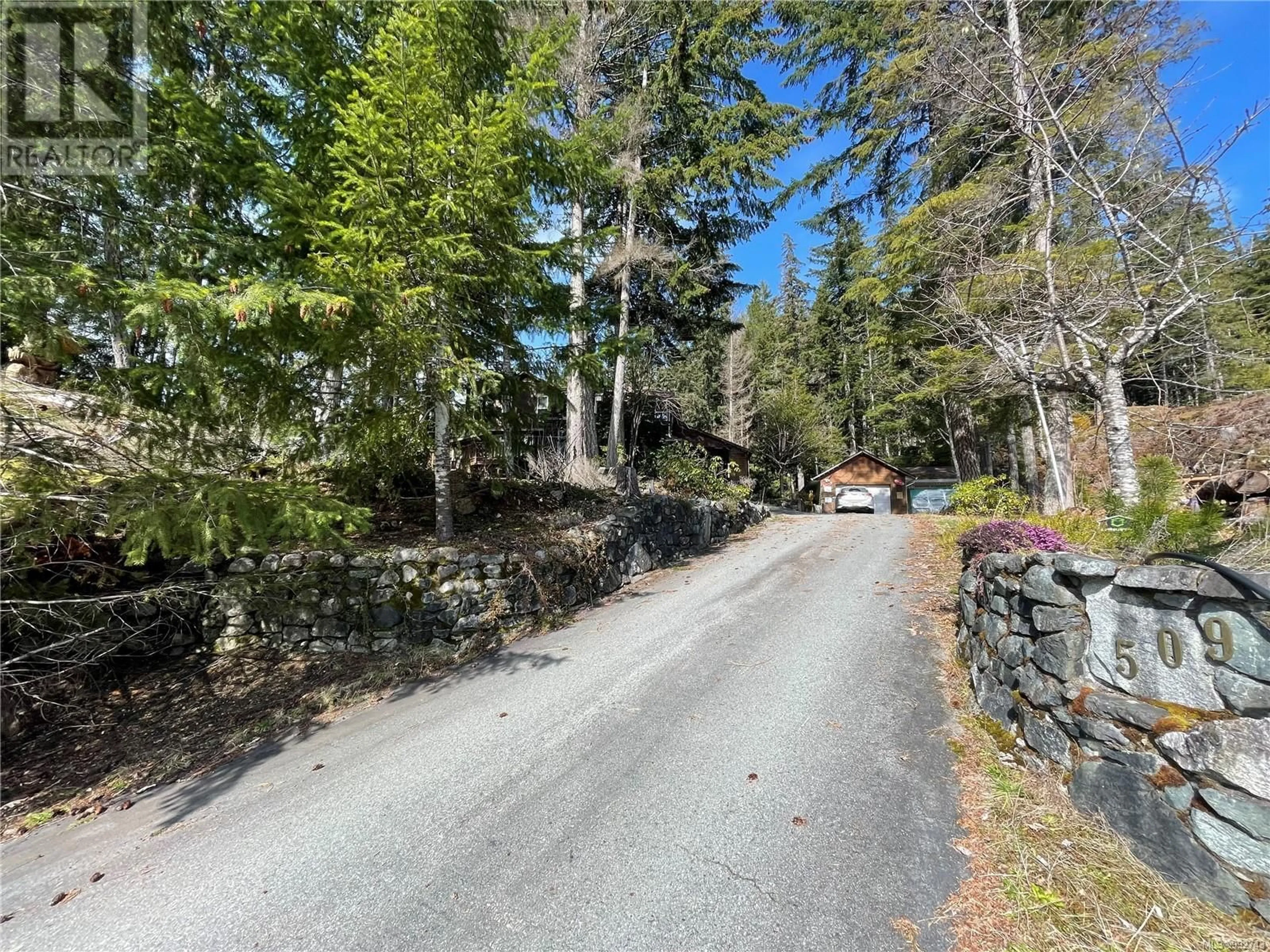 A pic from outside/outdoor area/front of a property/back of a property/a pic from drone, forest/trees view for 509 BURMAN COURT, Gold River British Columbia V0P1G0