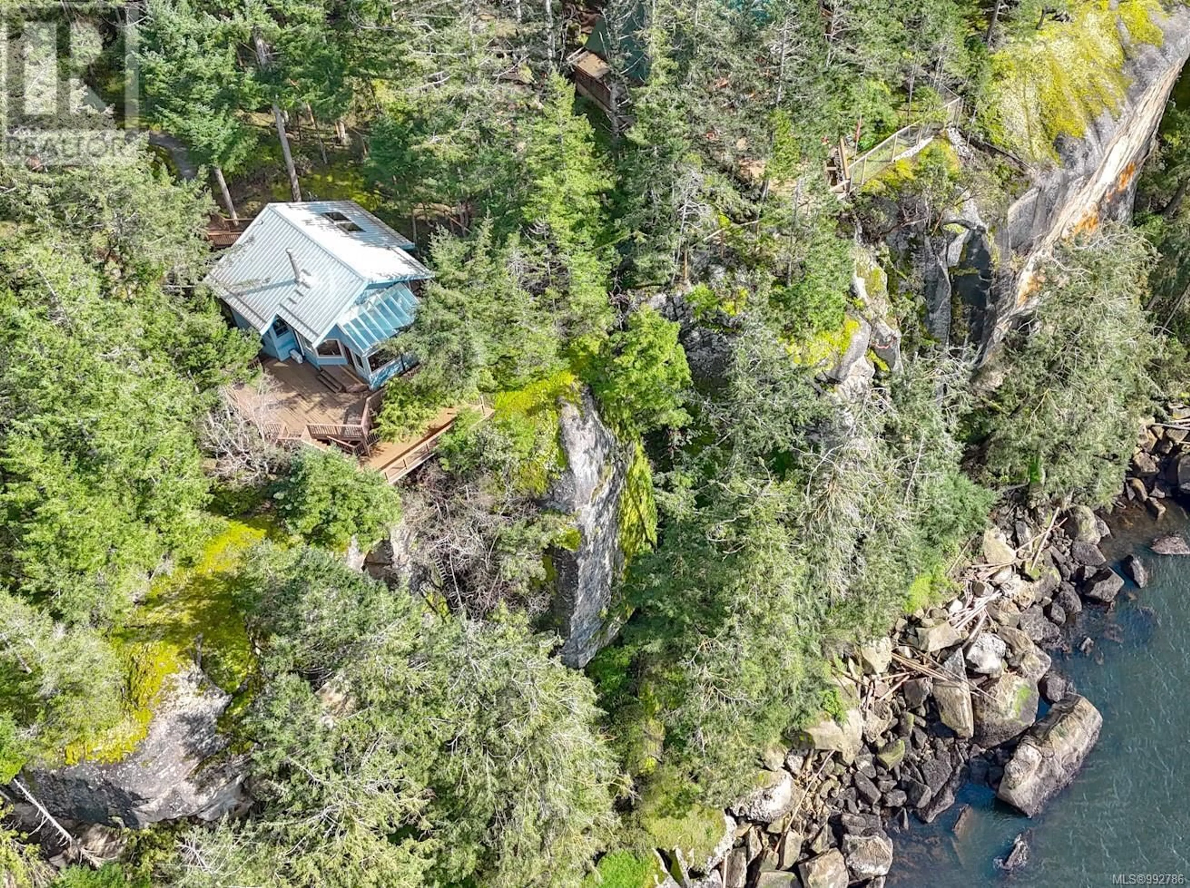 A pic from outside/outdoor area/front of a property/back of a property/a pic from drone, water/lake/river/ocean view for 851 CANSO ROAD, Gabriola Island British Columbia V0R1X2