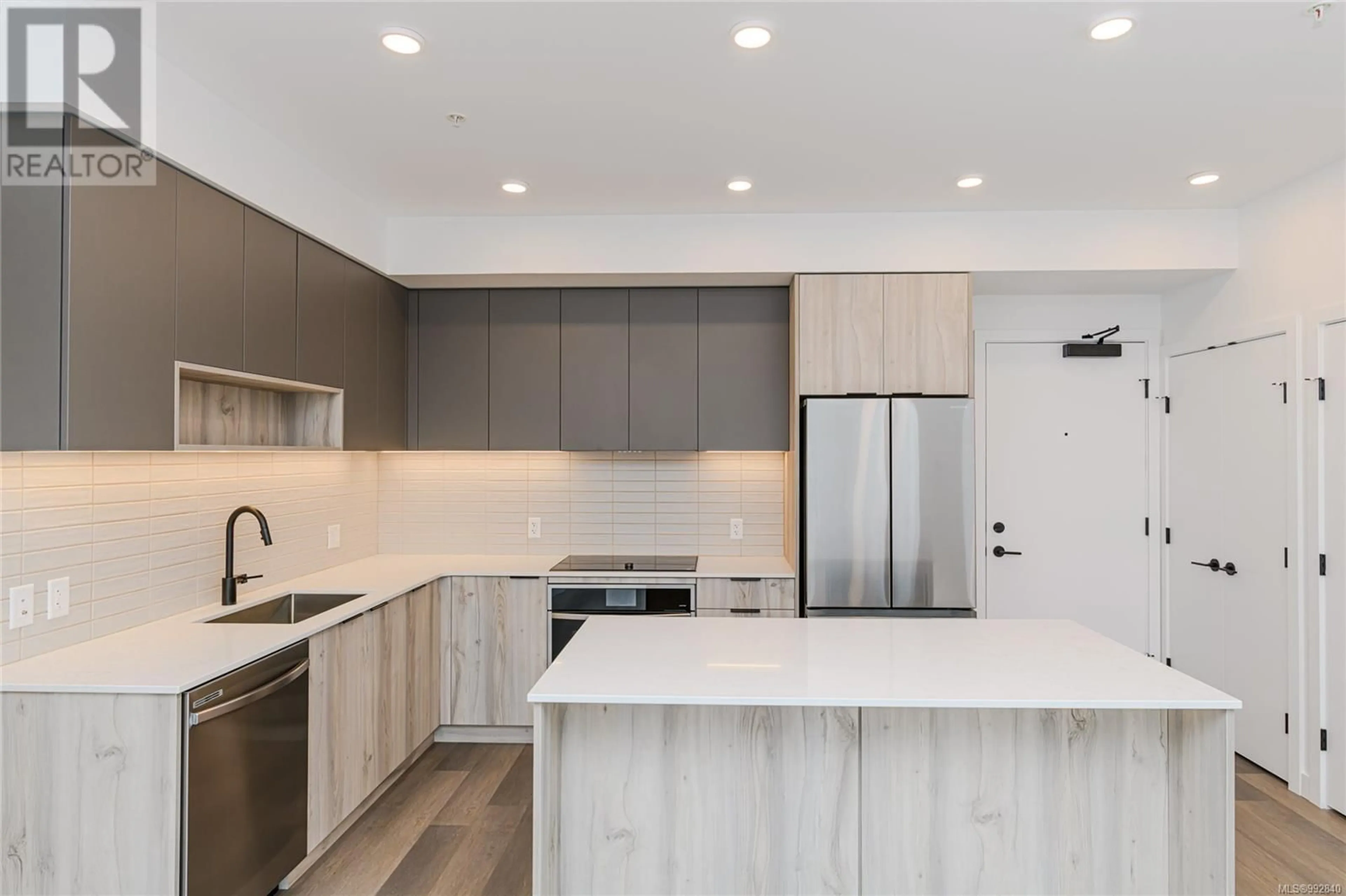 Open concept kitchen, unknown for 102 - 3564 A RYDER HESJEDAL WAY, Colwood British Columbia V9C0V3