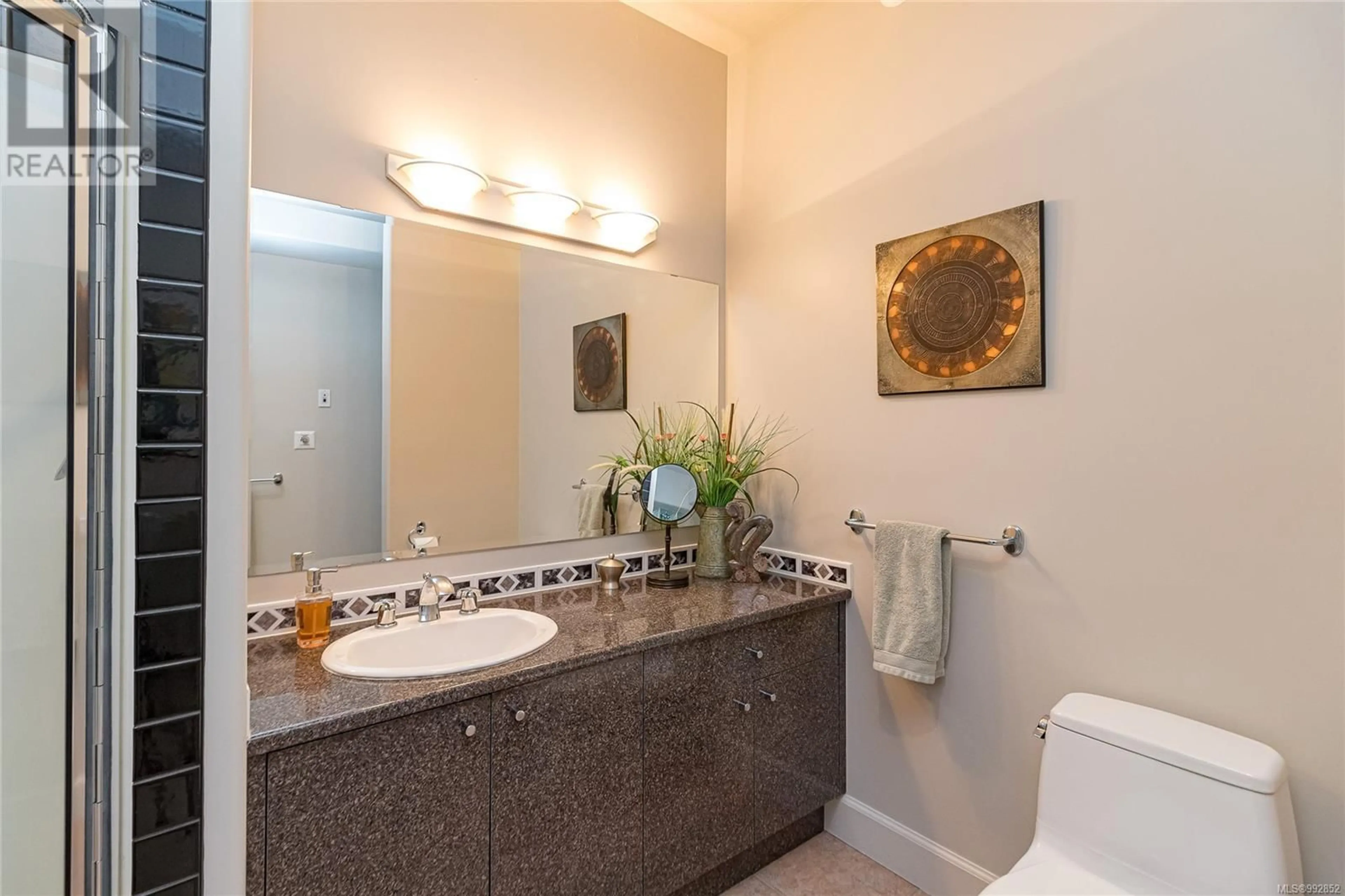 Standard bathroom, ceramic/tile floor for 3450 LORD NELSON WAY, Saanich British Columbia V8P5T9