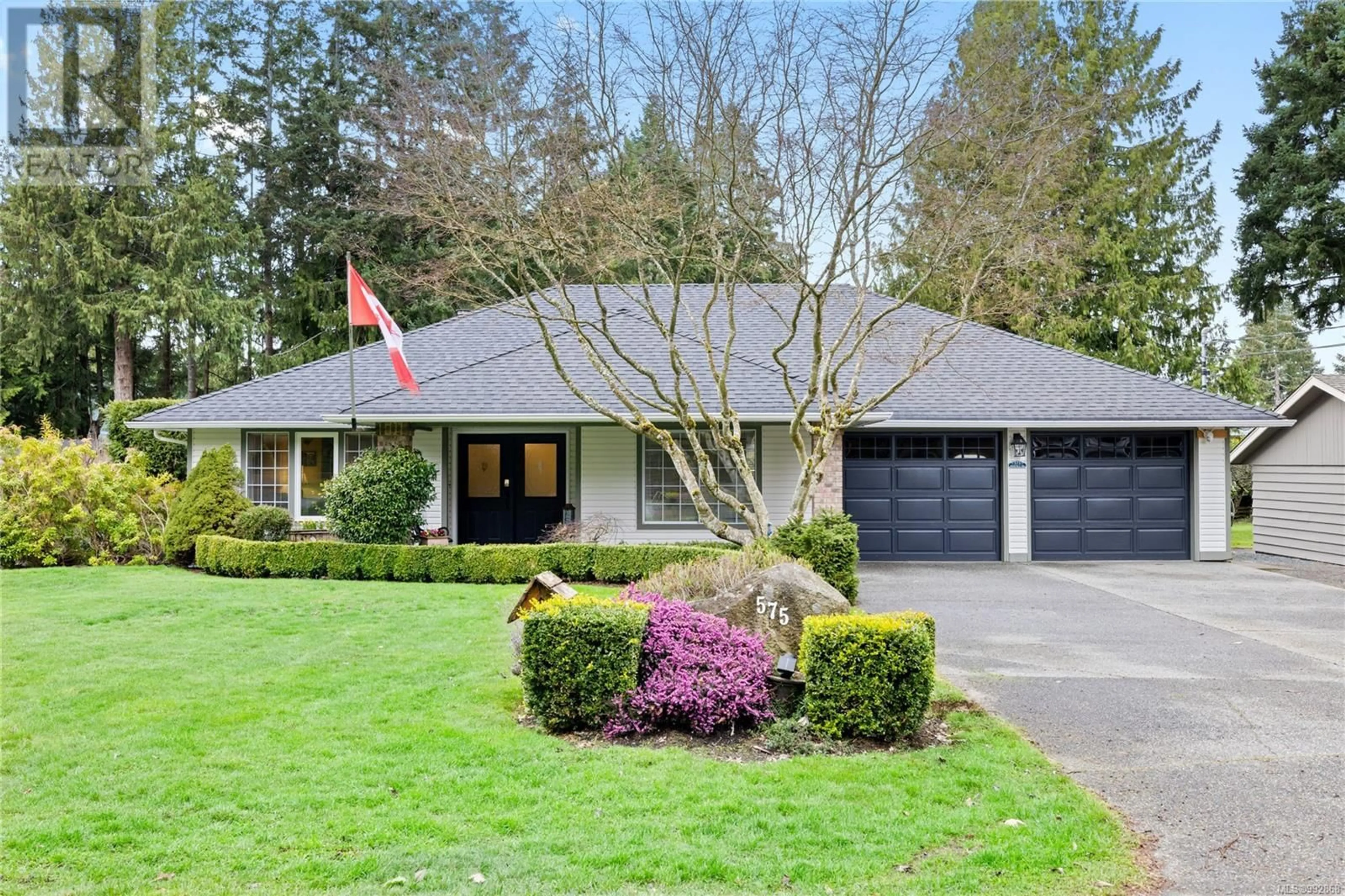 Home with brick exterior material, street for 575 Nootka Rd, Qualicum Beach British Columbia V9K1A3