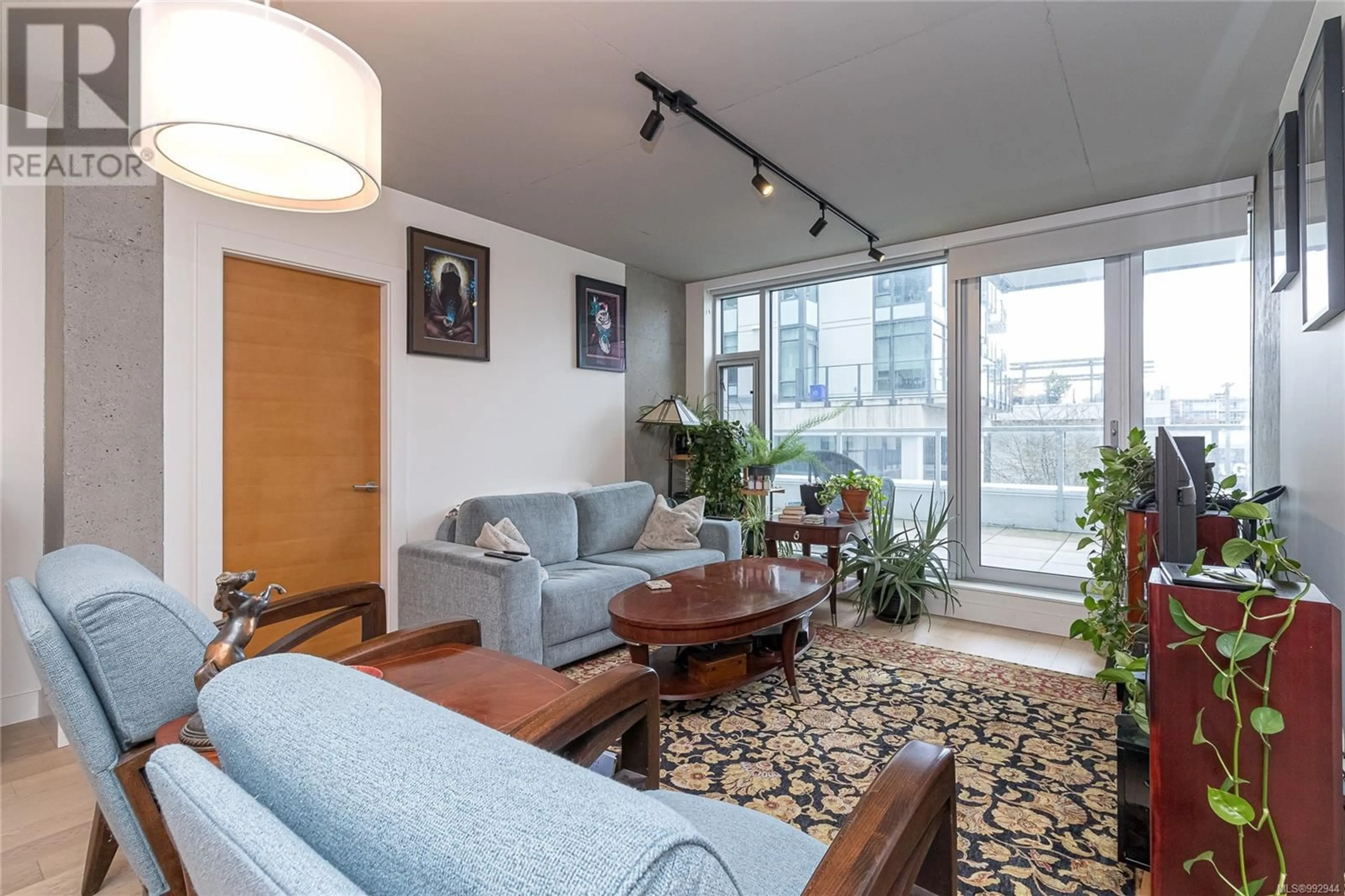 Living room with furniture, unknown for 201 - 989 JOHNSON STREET, Victoria British Columbia V8V3N7