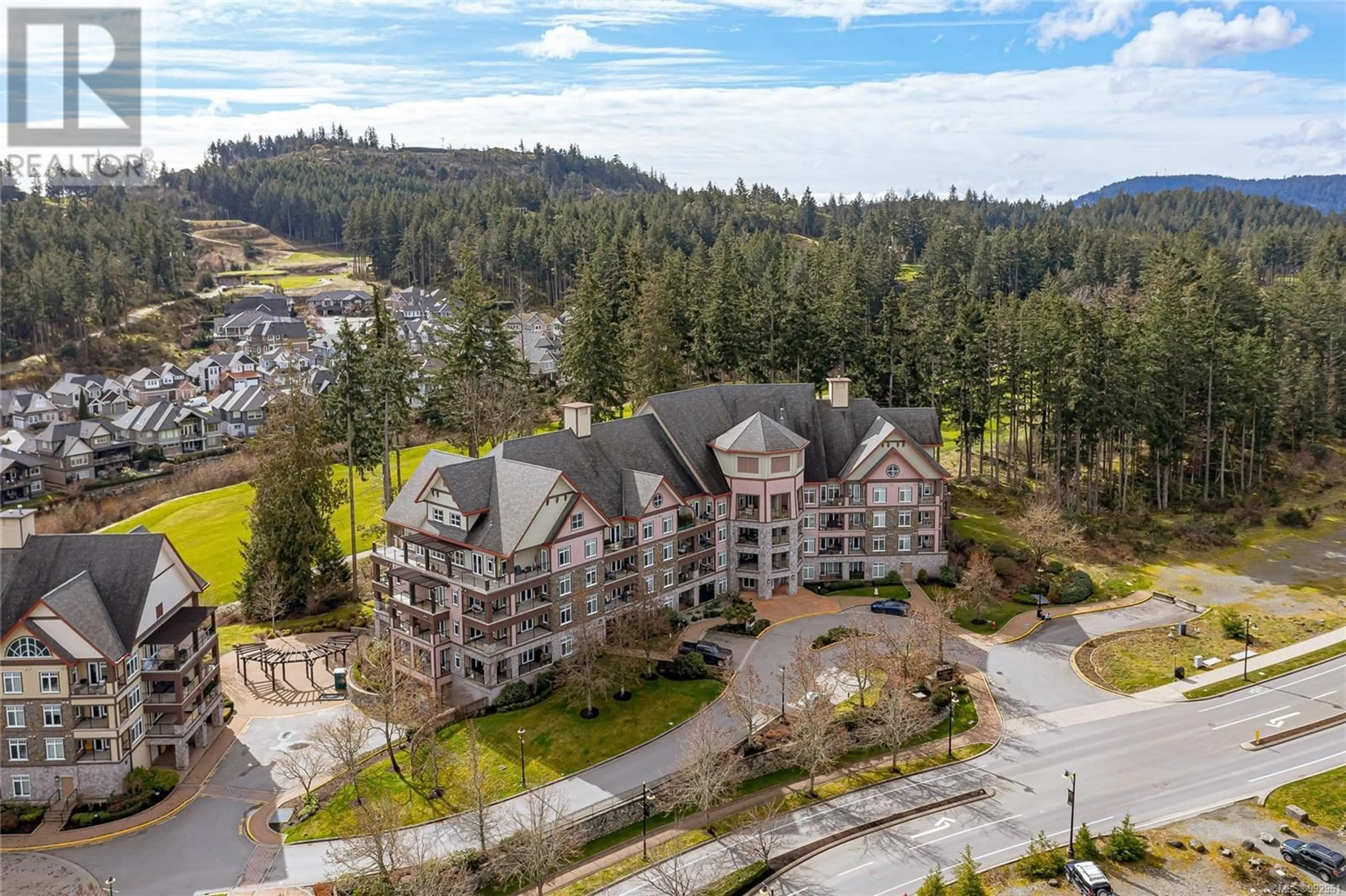 A pic from outside/outdoor area/front of a property/back of a property/a pic from drone, water/lake/river/ocean view for 302 - 1395 BEAR MOUNTAIN PARKWAY, Langford British Columbia V9B0E1
