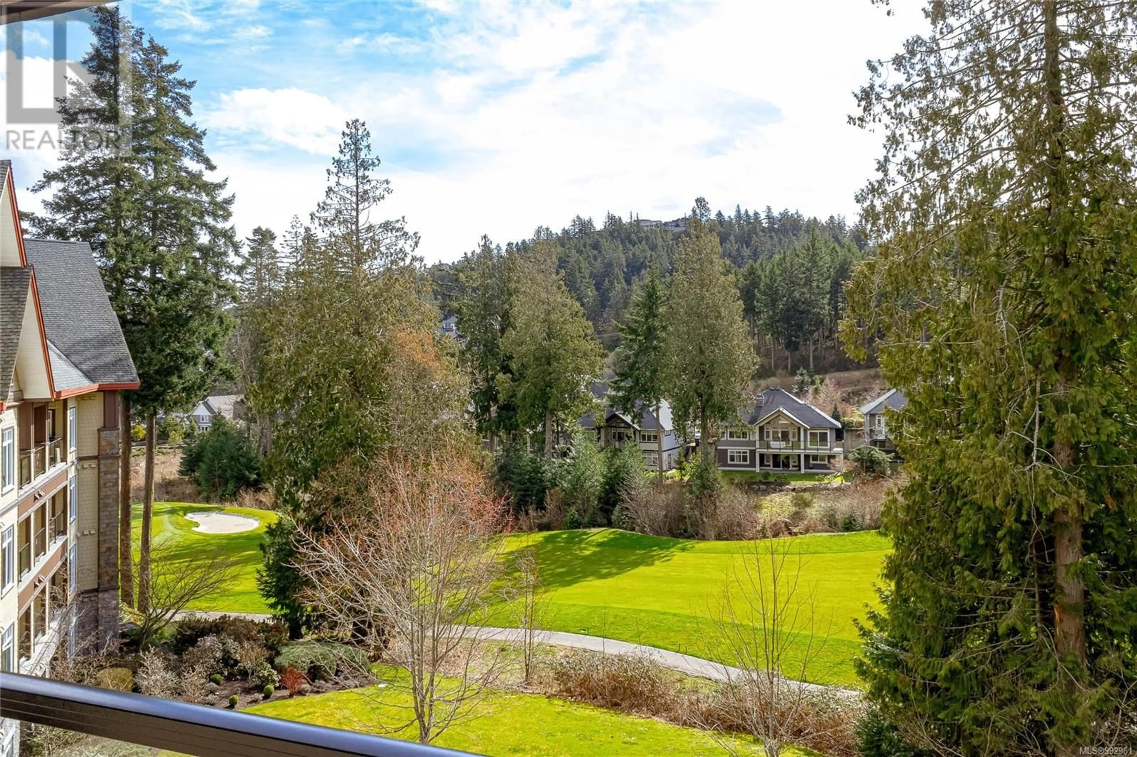 A pic from outside/outdoor area/front of a property/back of a property/a pic from drone, forest/trees view for 302 - 1395 BEAR MOUNTAIN PARKWAY, Langford British Columbia V9B0E1