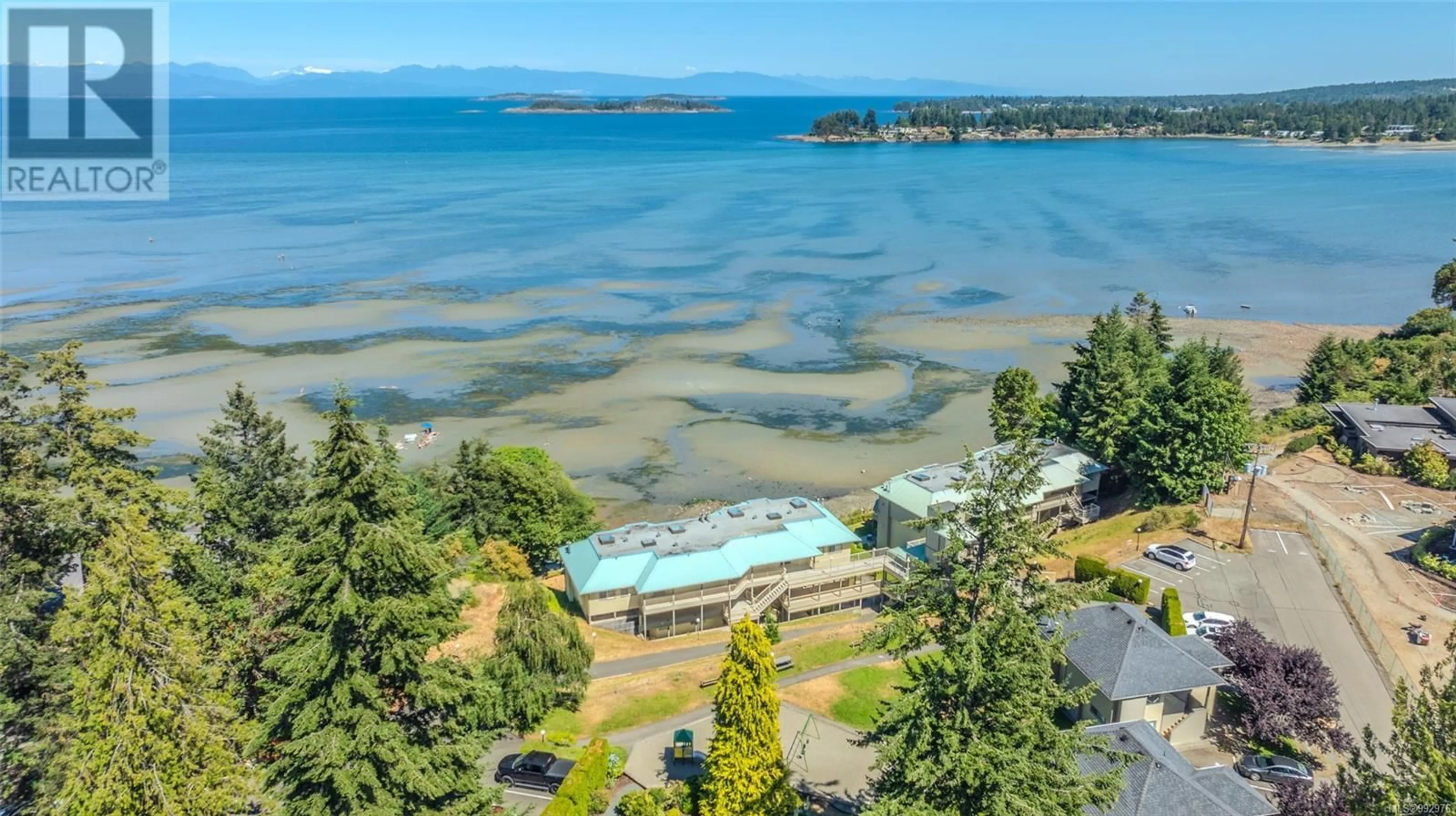 A pic from outside/outdoor area/front of a property/back of a property/a pic from drone, water/lake/river/ocean view for 309 - 1165 RESORT DRIVE, Parksville British Columbia V9P2E2
