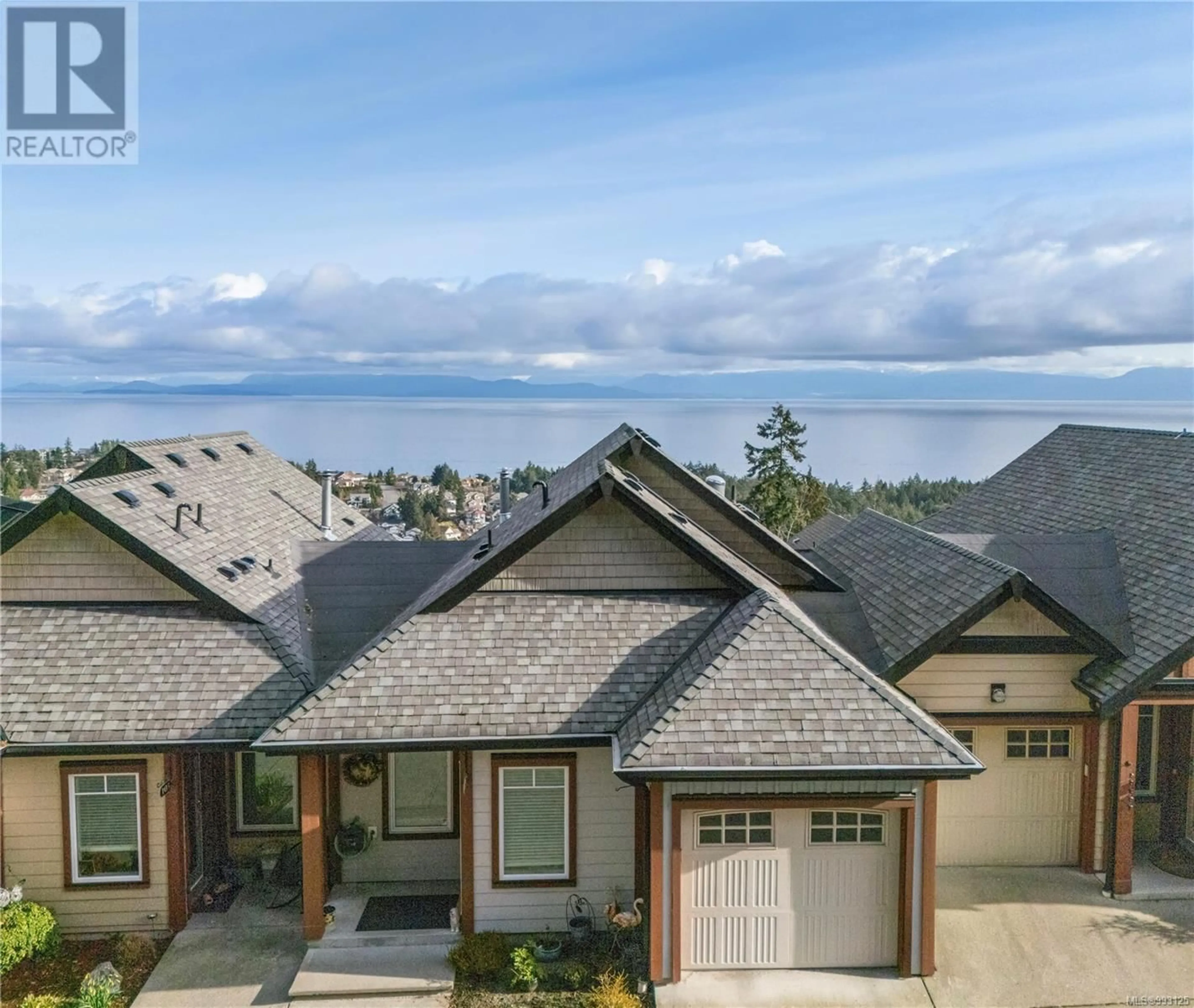 A pic from outside/outdoor area/front of a property/back of a property/a pic from drone, water/lake/river/ocean view for 104 - 4745 GRANDVIEW COURT, Nanaimo British Columbia V9T0C1