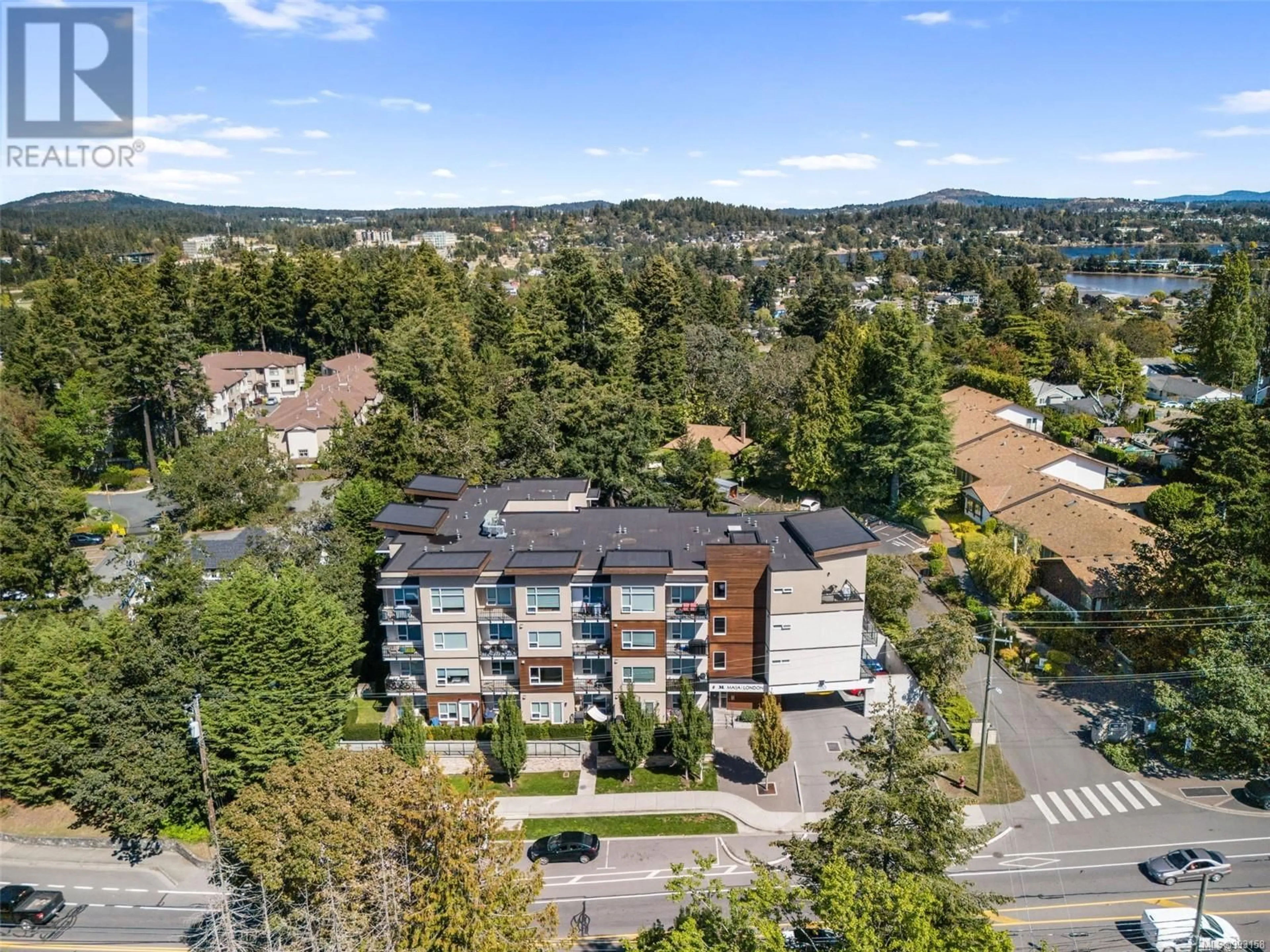 A pic from outside/outdoor area/front of a property/back of a property/a pic from drone, unknown for 305 - 280 ISLAND HIGHWAY, View Royal British Columbia V9B1G5