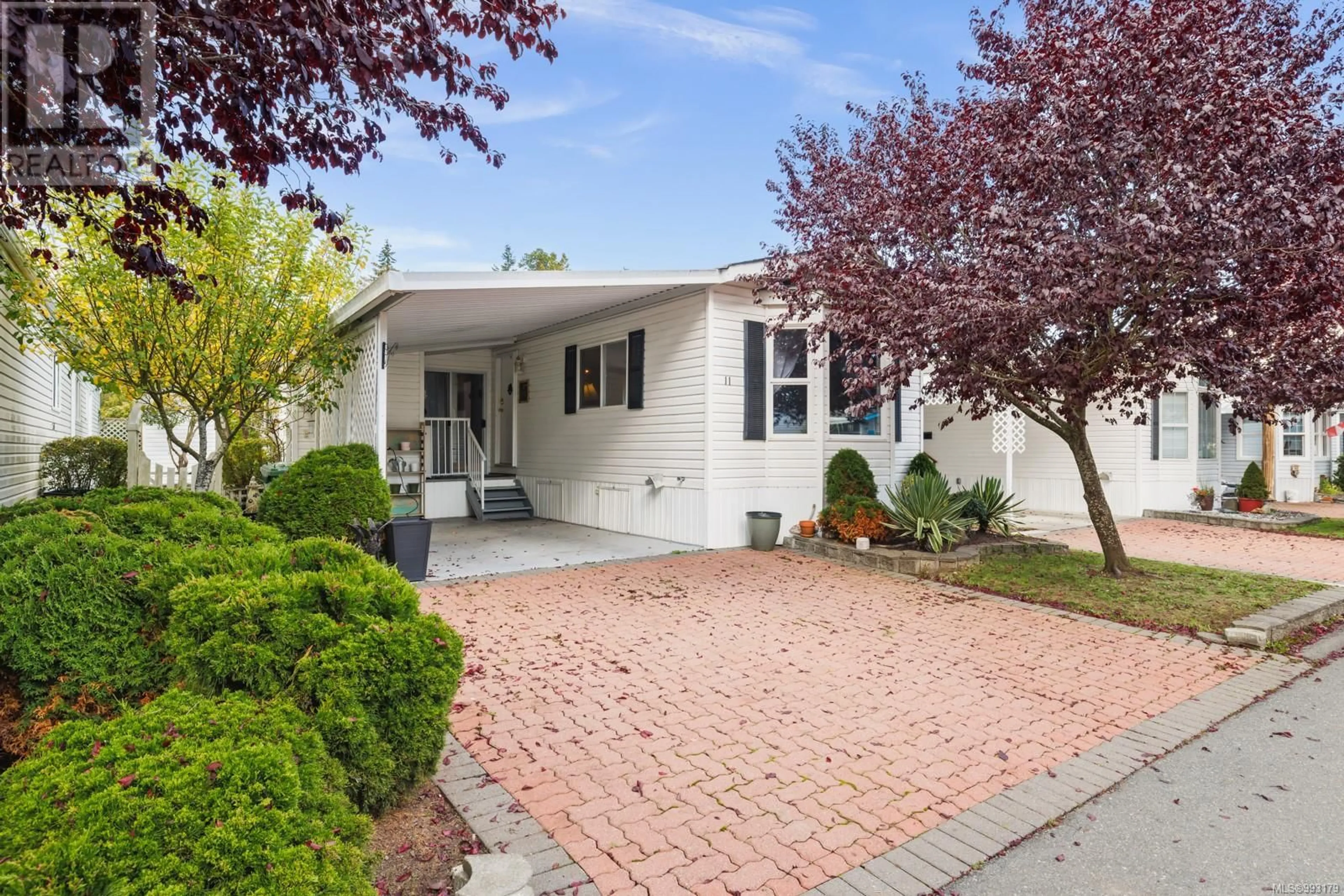 Home with vinyl exterior material, street for 11 - 7401 CENTRAL SAANICH ROAD, Central Saanich British Columbia V8M2B5