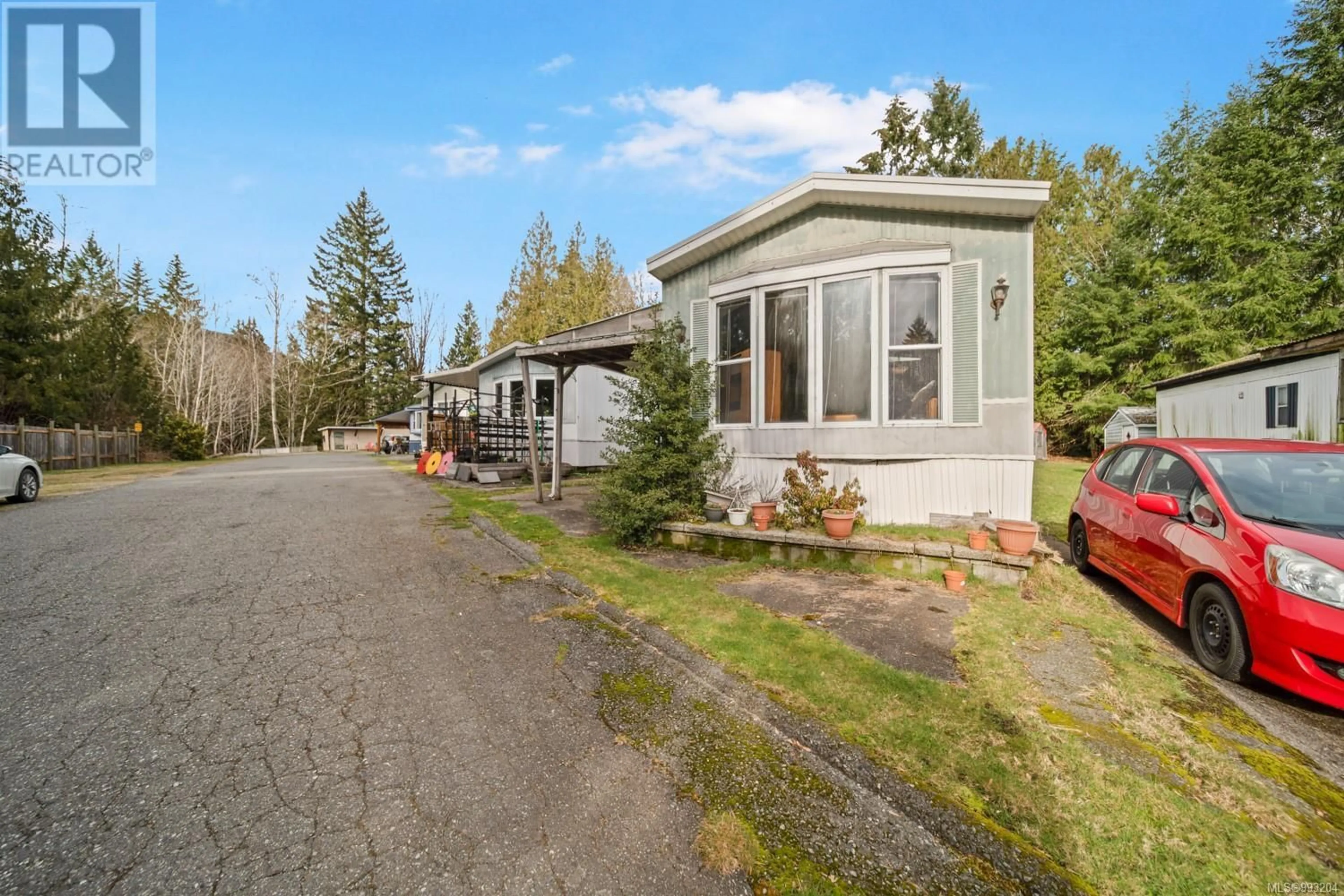 Home with vinyl exterior material, street for 7 - 8697 NORTH SHORE ROAD, Lake Cowichan British Columbia V0R2G0