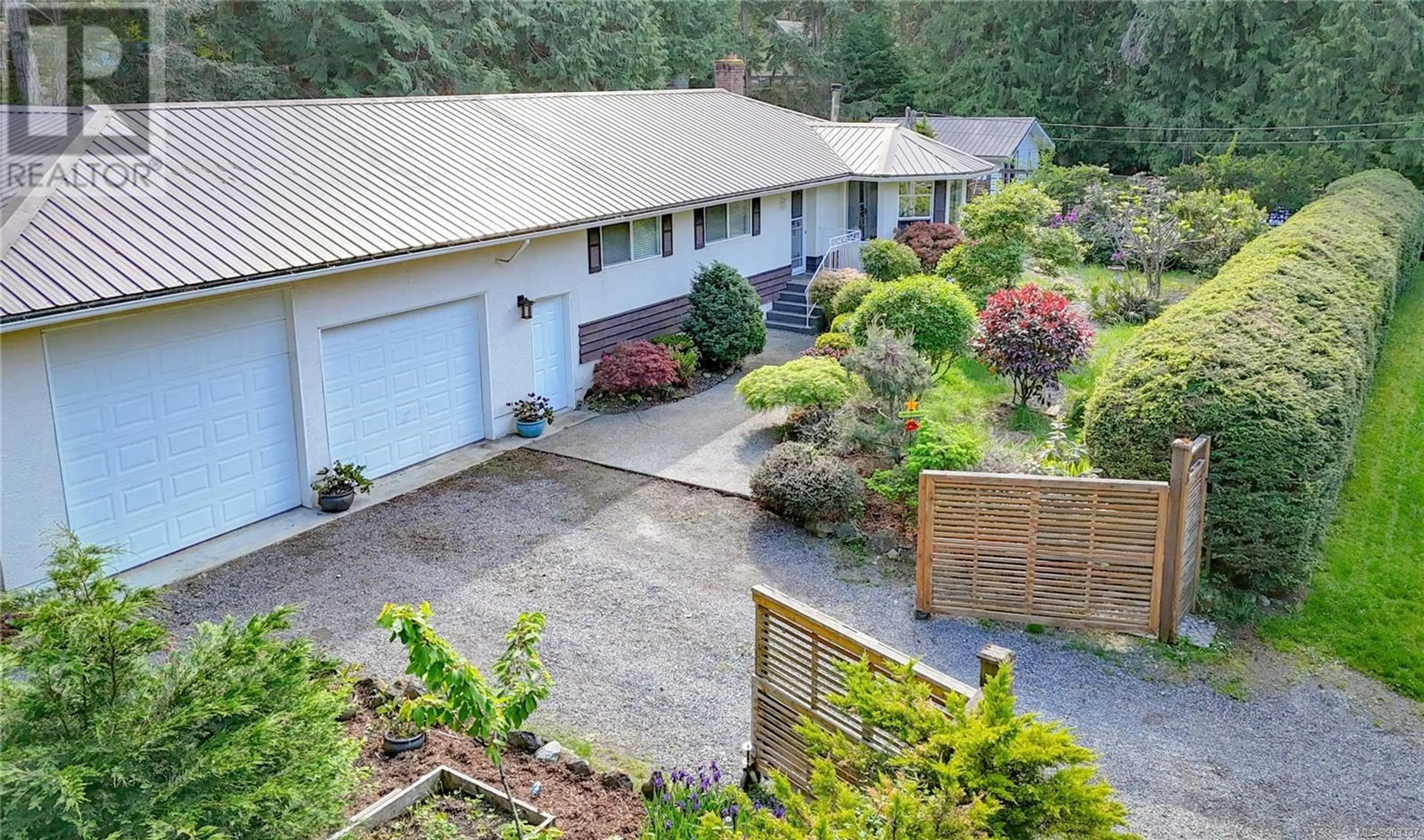 A pic from outside/outdoor area/front of a property/back of a property/a pic from drone, street for 34 MALASPINA DRIVE, Gabriola Island British Columbia V0R1X1