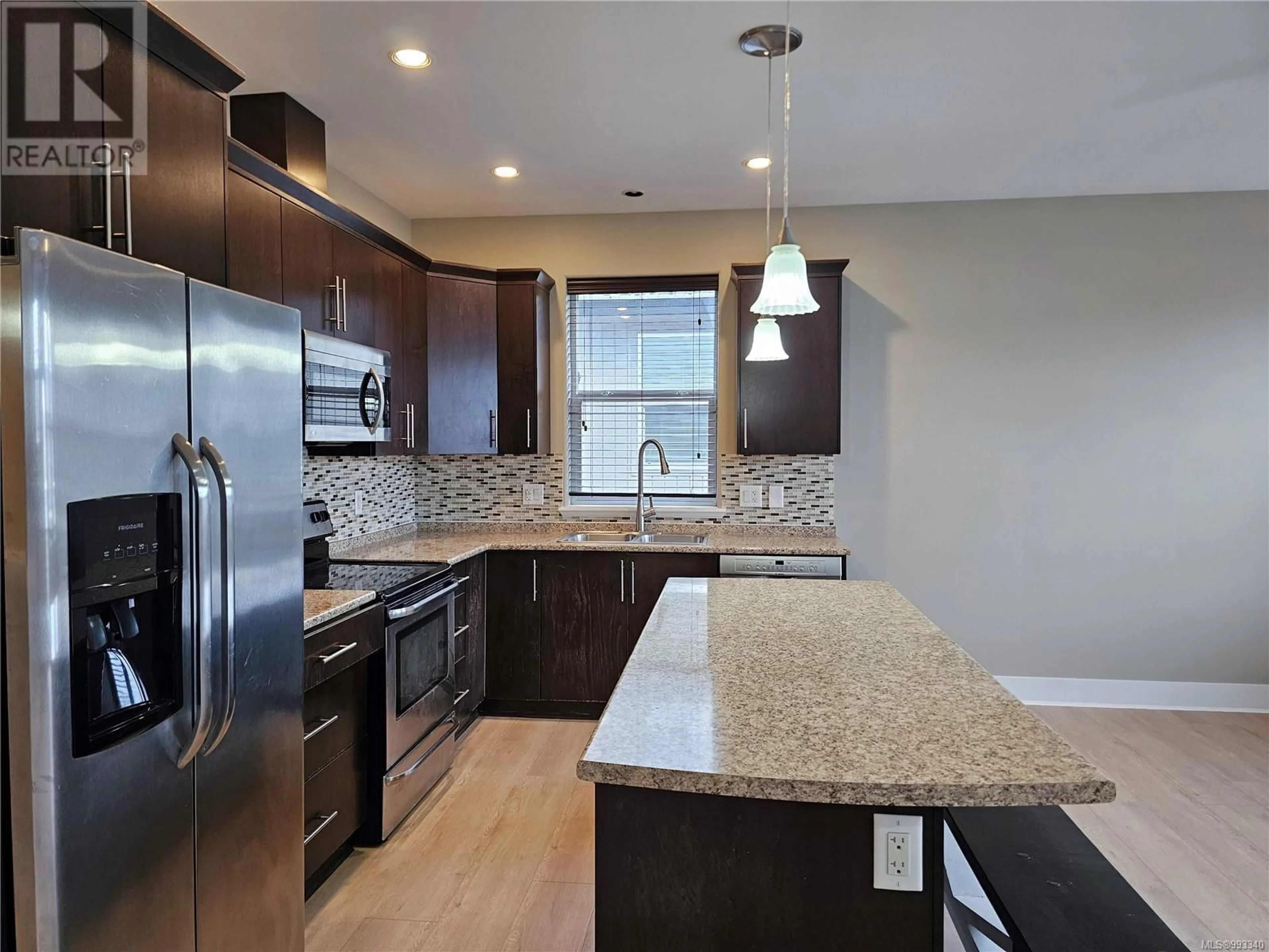 Open concept kitchen, ceramic/tile floor for 1024 BROWN ROAD, Langford British Columbia V9C2P7