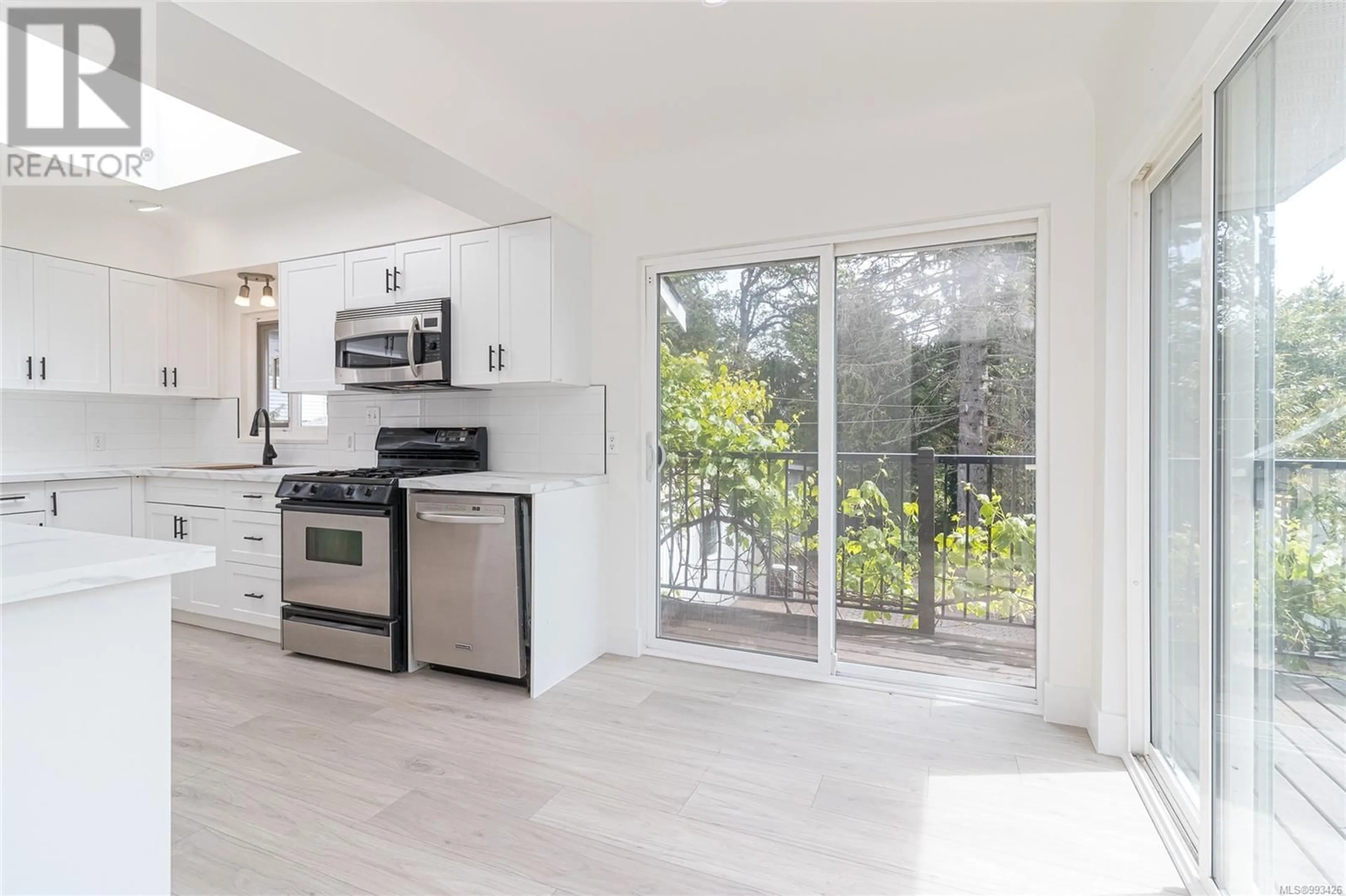 Open concept kitchen, ceramic/tile floor for 1515 ARROW ROAD, Saanich British Columbia V8N1C3