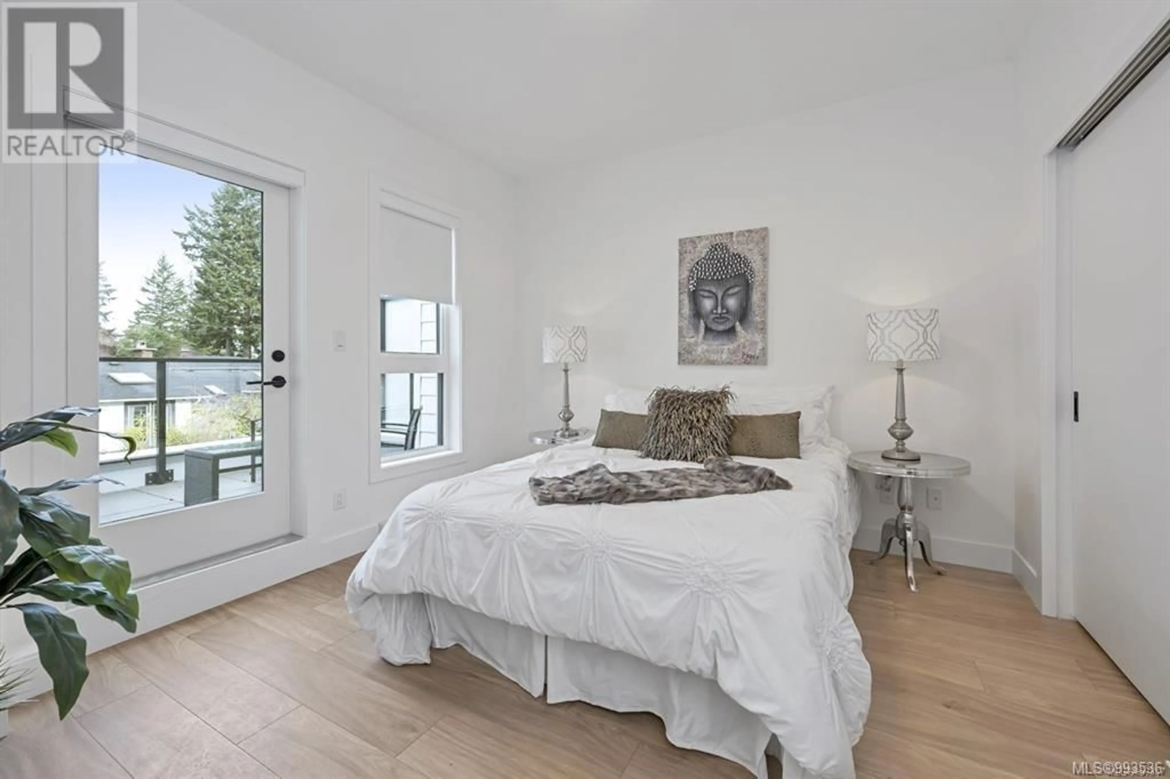 Bedroom with bed, wood/laminate floor for 10 - 2330 SOOKE ROAD, Colwood British Columbia V9B1X7