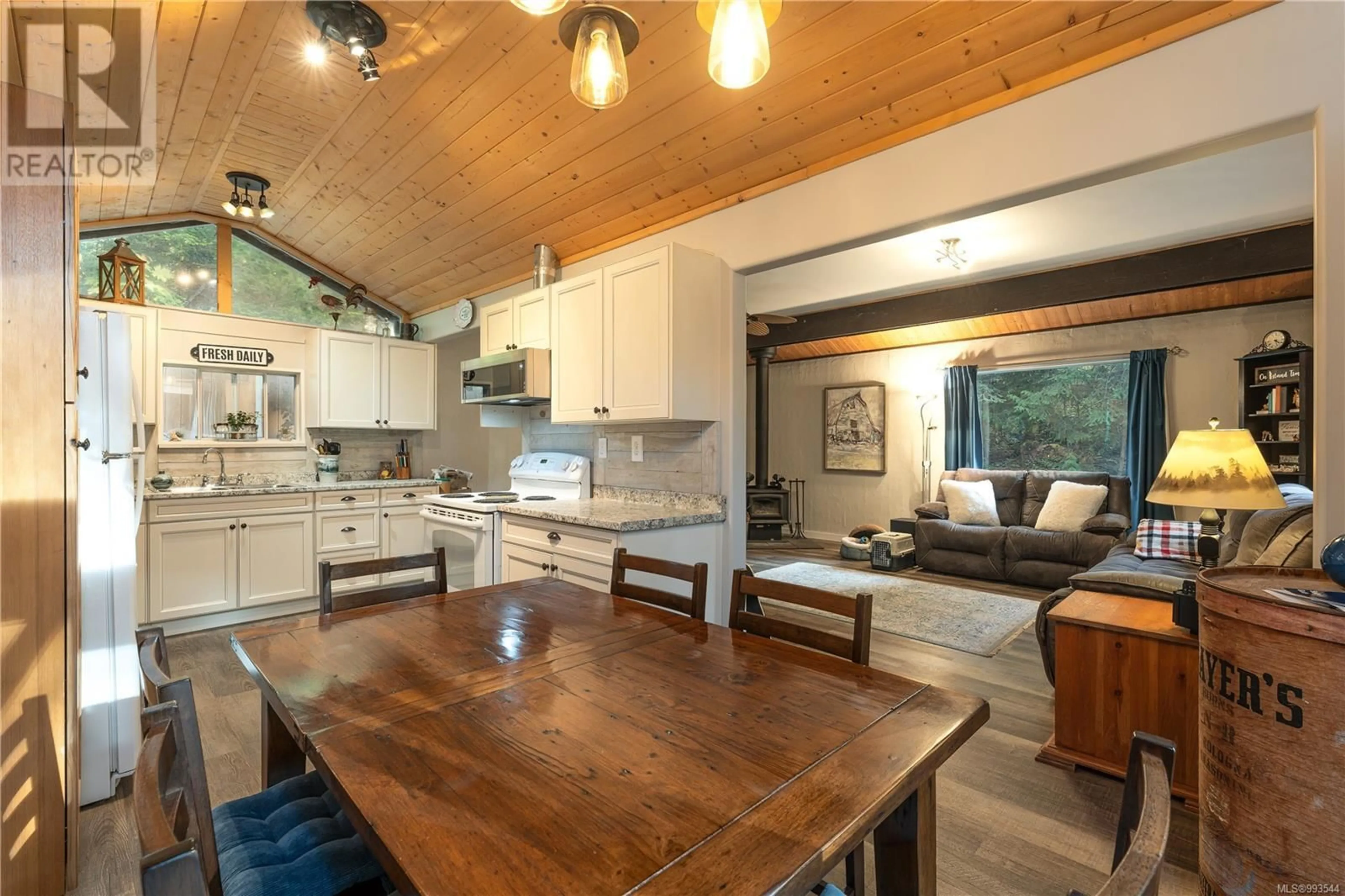 Open concept kitchen, wood/laminate floor for 379 HEMLOCK AVENUE, Gabriola Island British Columbia V0R1X1