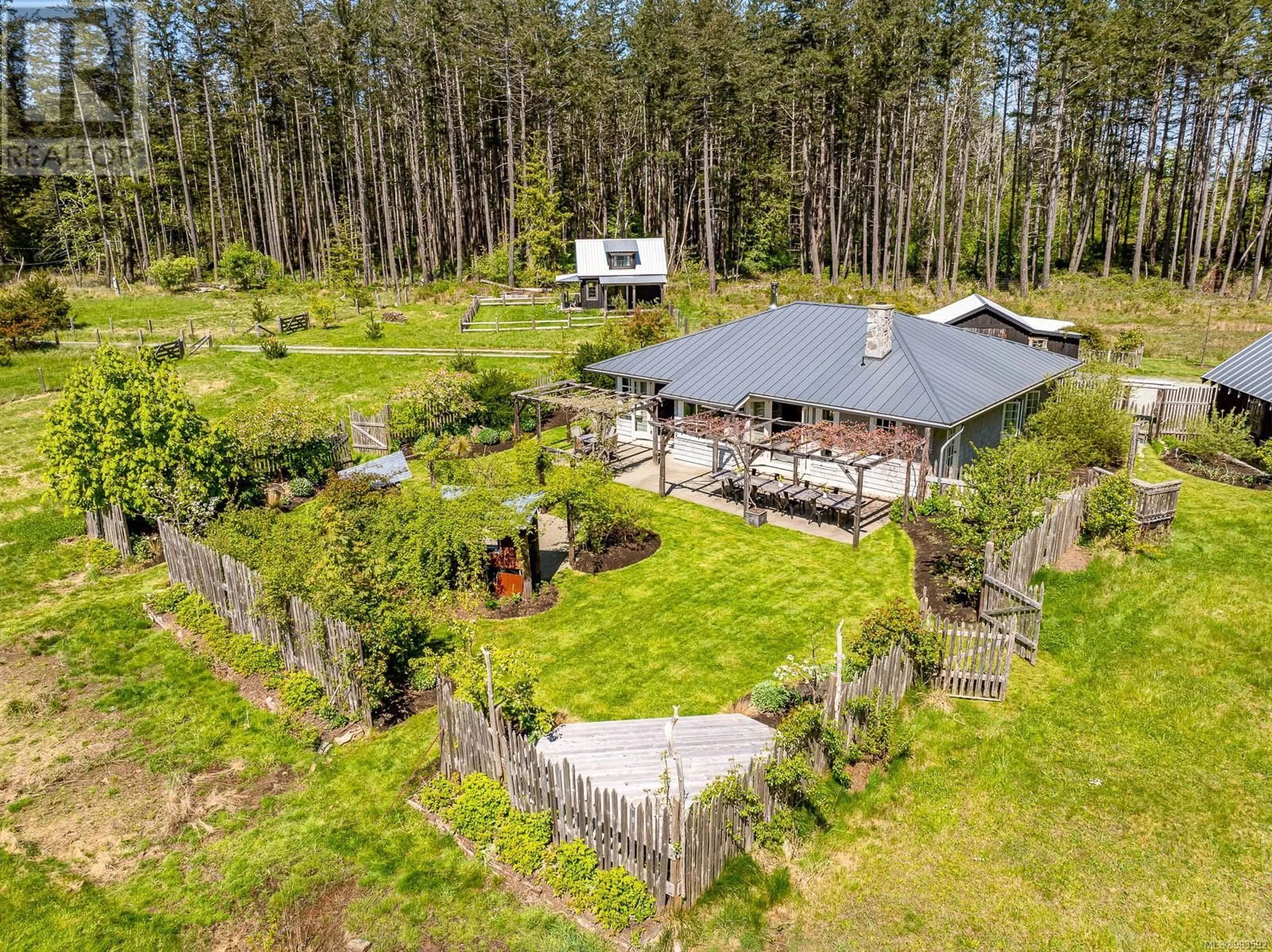 A pic from outside/outdoor area/front of a property/back of a property/a pic from drone, forest/trees view for 1760 OSTBY ROAD, Hornby Island British Columbia V0R1Z0