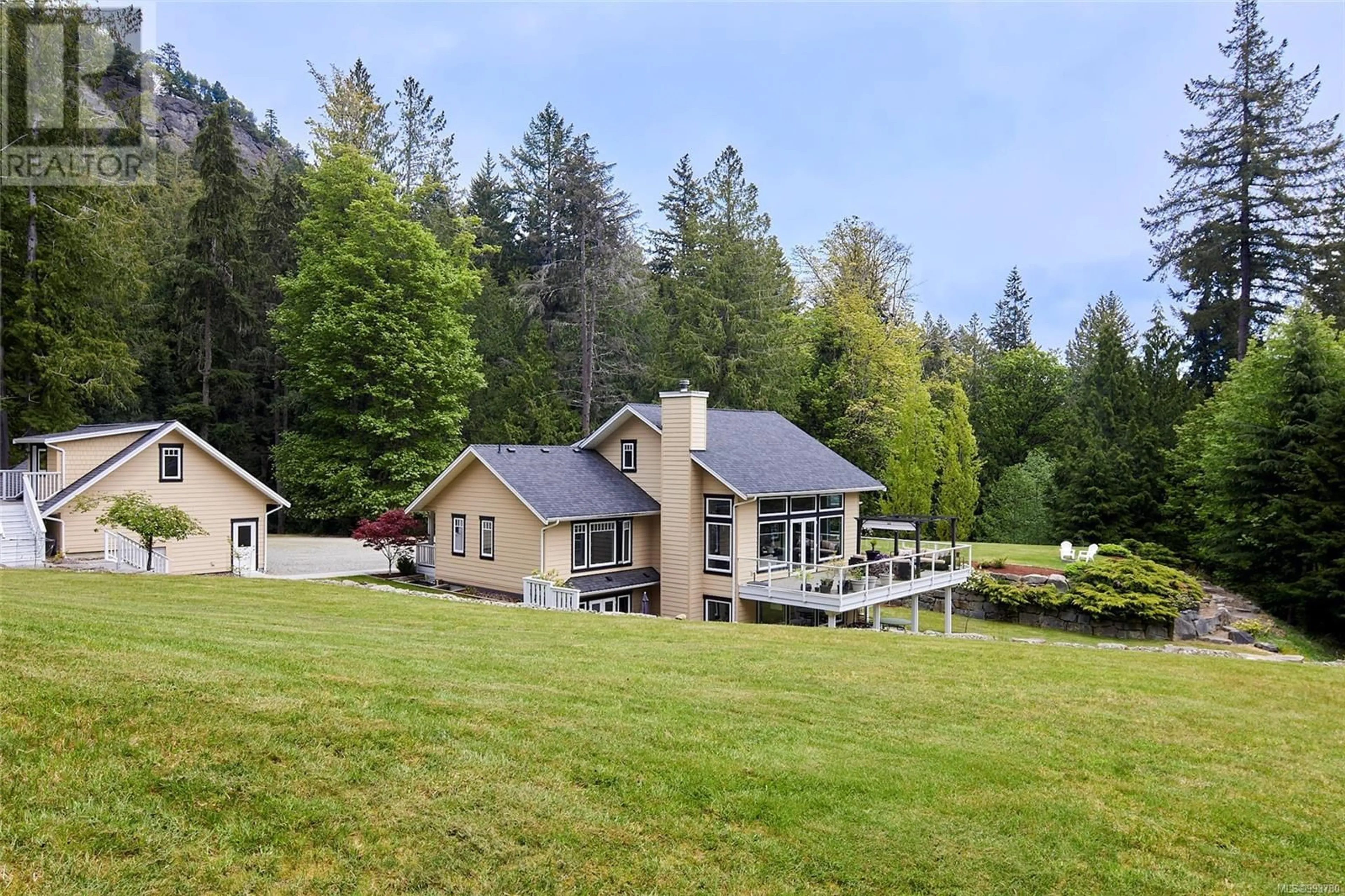 A pic from outside/outdoor area/front of a property/back of a property/a pic from drone, mountain view for 571 CRANBERRY ROAD, Salt Spring British Columbia V8K2H2