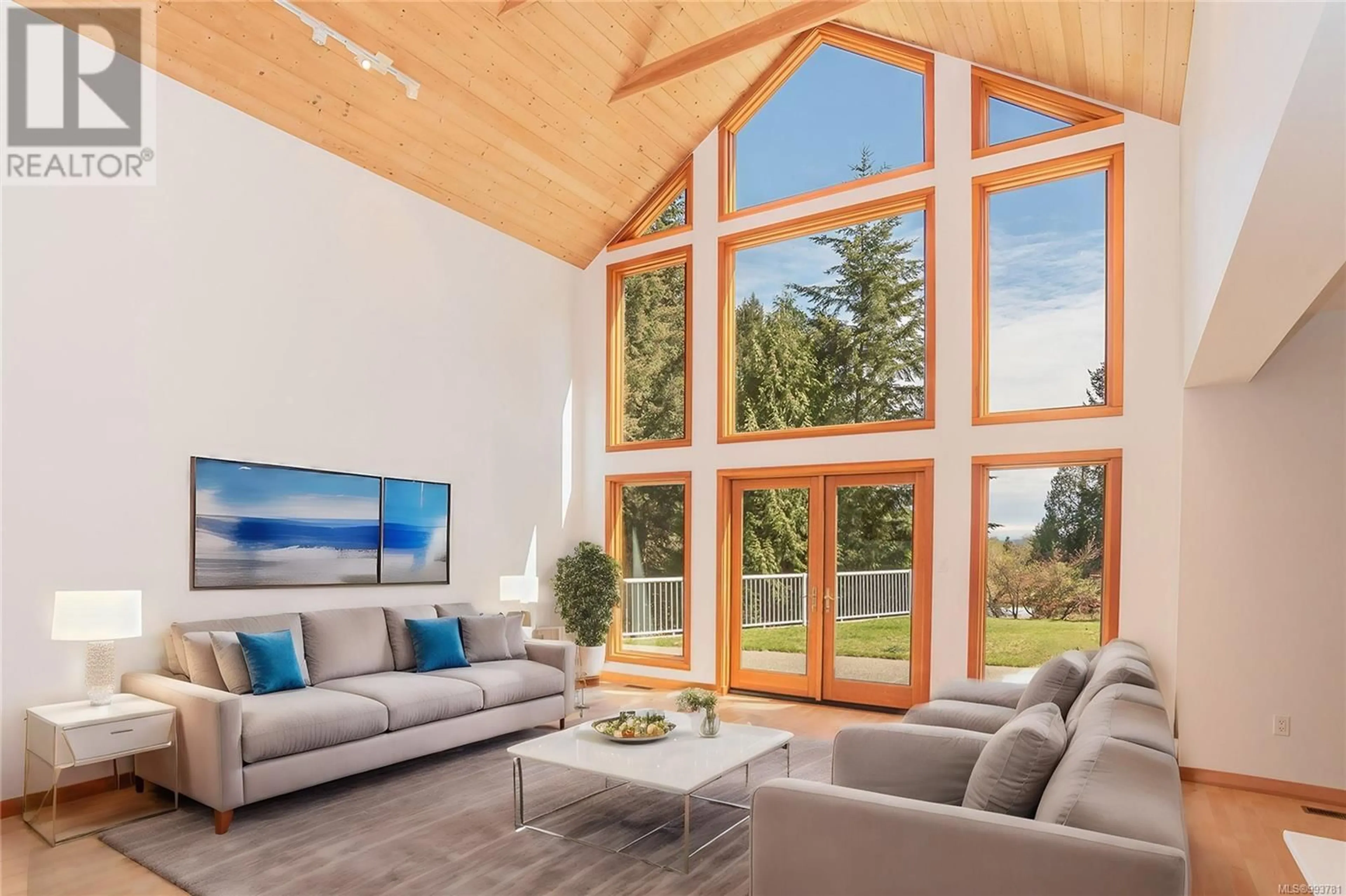 Living room with furniture, wood/laminate floor for 212 HAMILTON-HORNE WAY, Salt Spring British Columbia V9L3B8