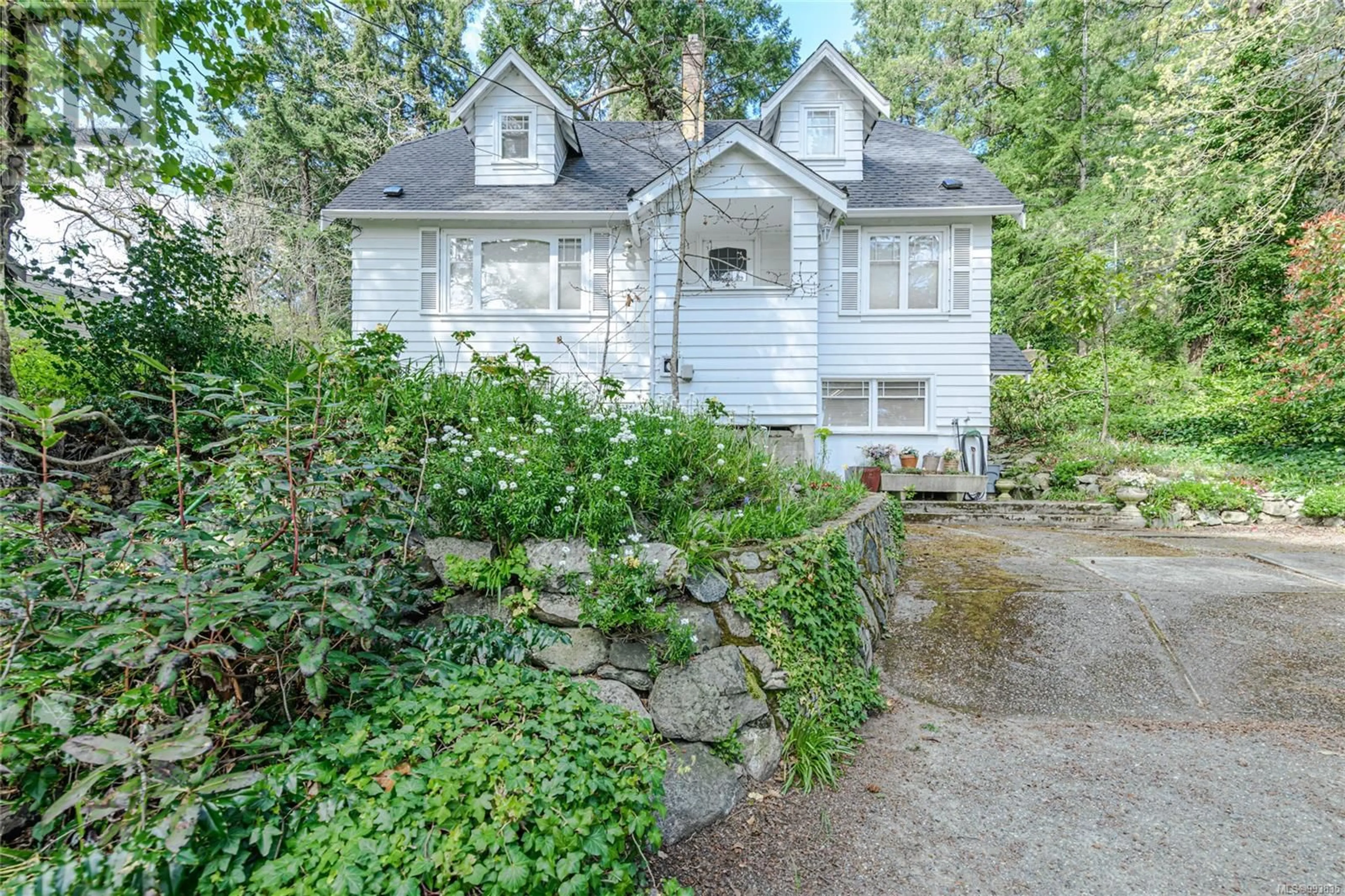 A pic from outside/outdoor area/front of a property/back of a property/a pic from drone, street for 1254 BURNSIDE ROAD WEST, View Royal British Columbia V8Z1N9