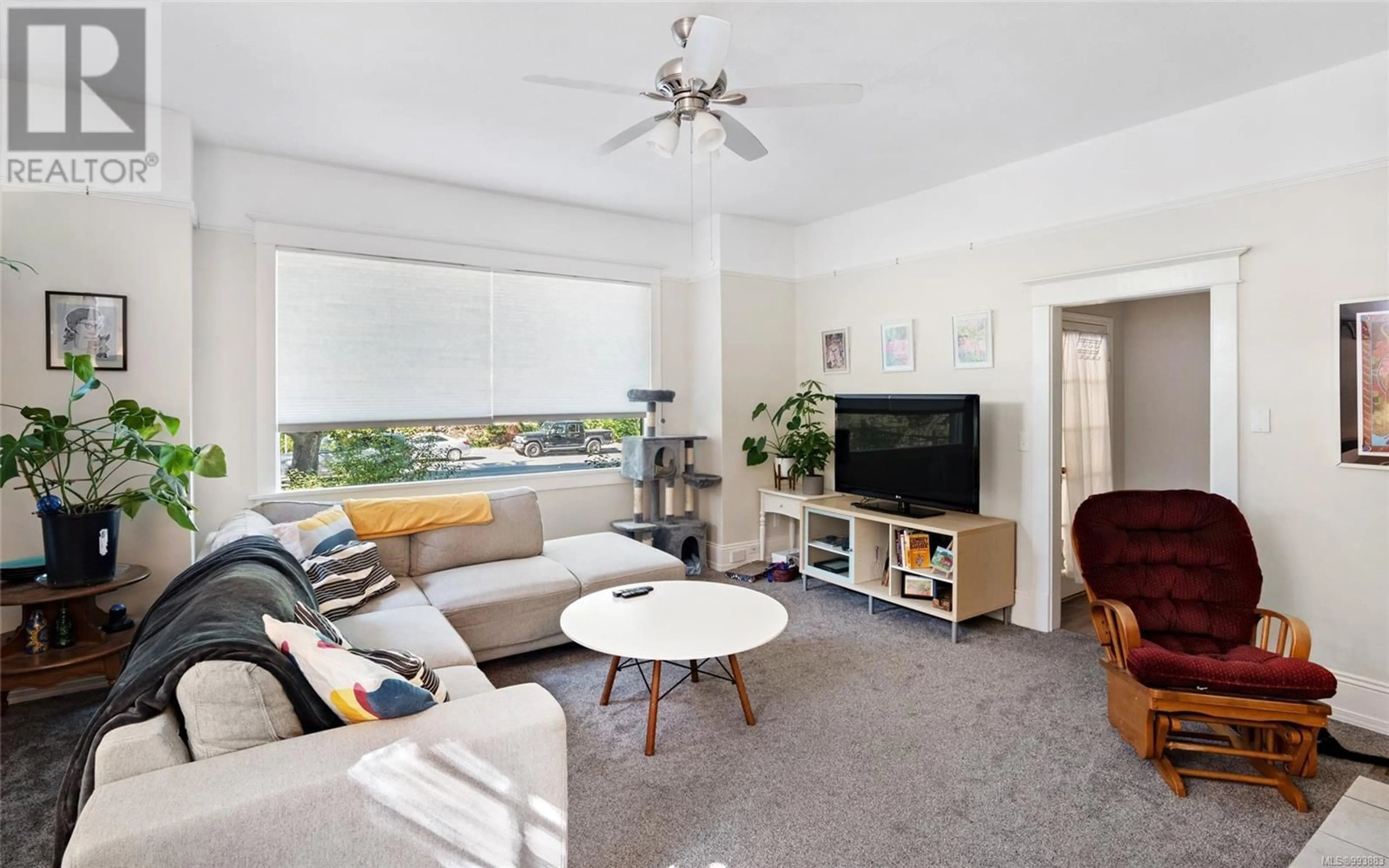Living room with furniture, unknown for 3439 COOK STREET, Saanich British Columbia V8X1B2