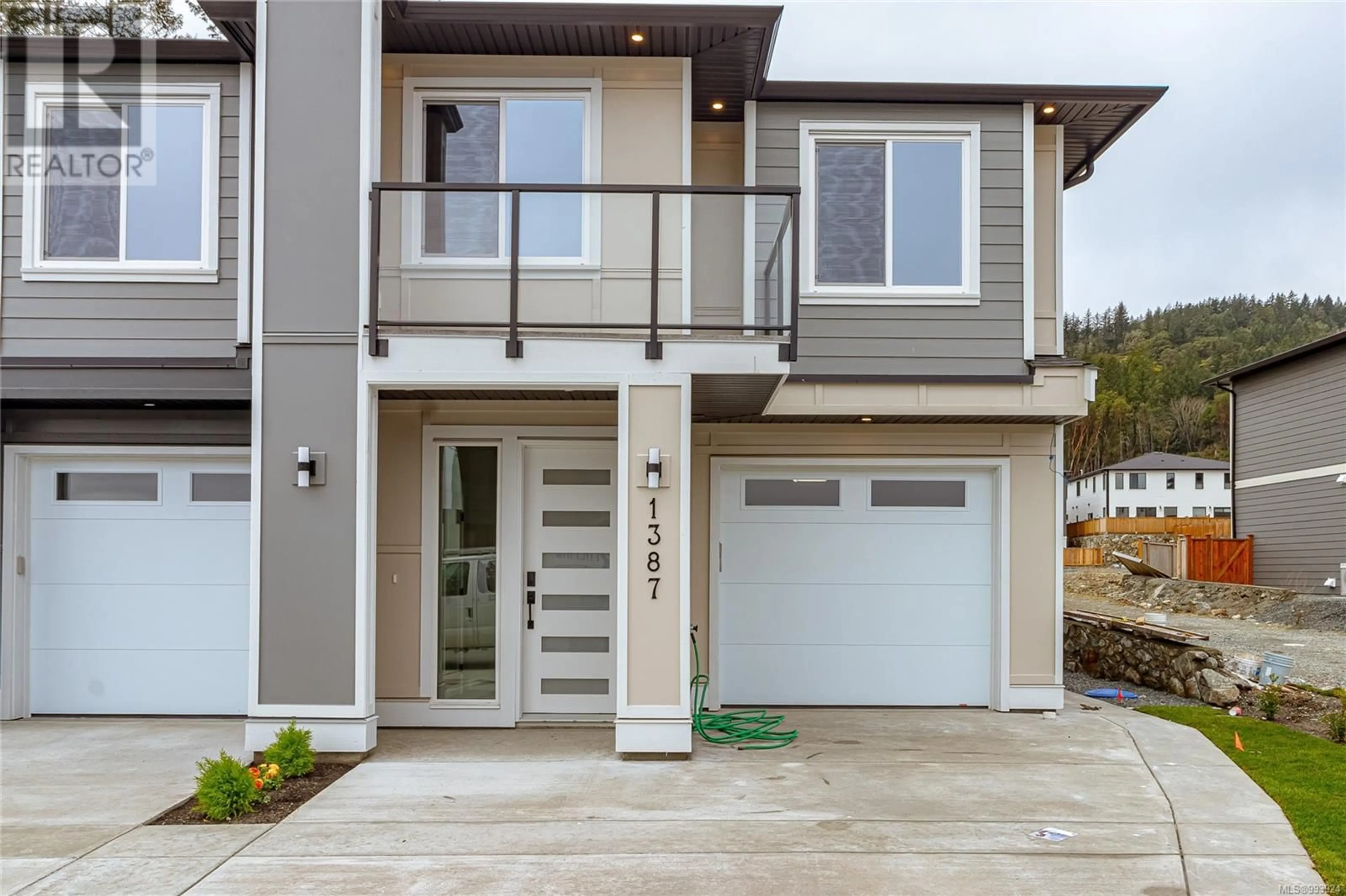 Home with vinyl exterior material, street for 1387 SANDSTONE LANE, Langford British Columbia V9B7A2