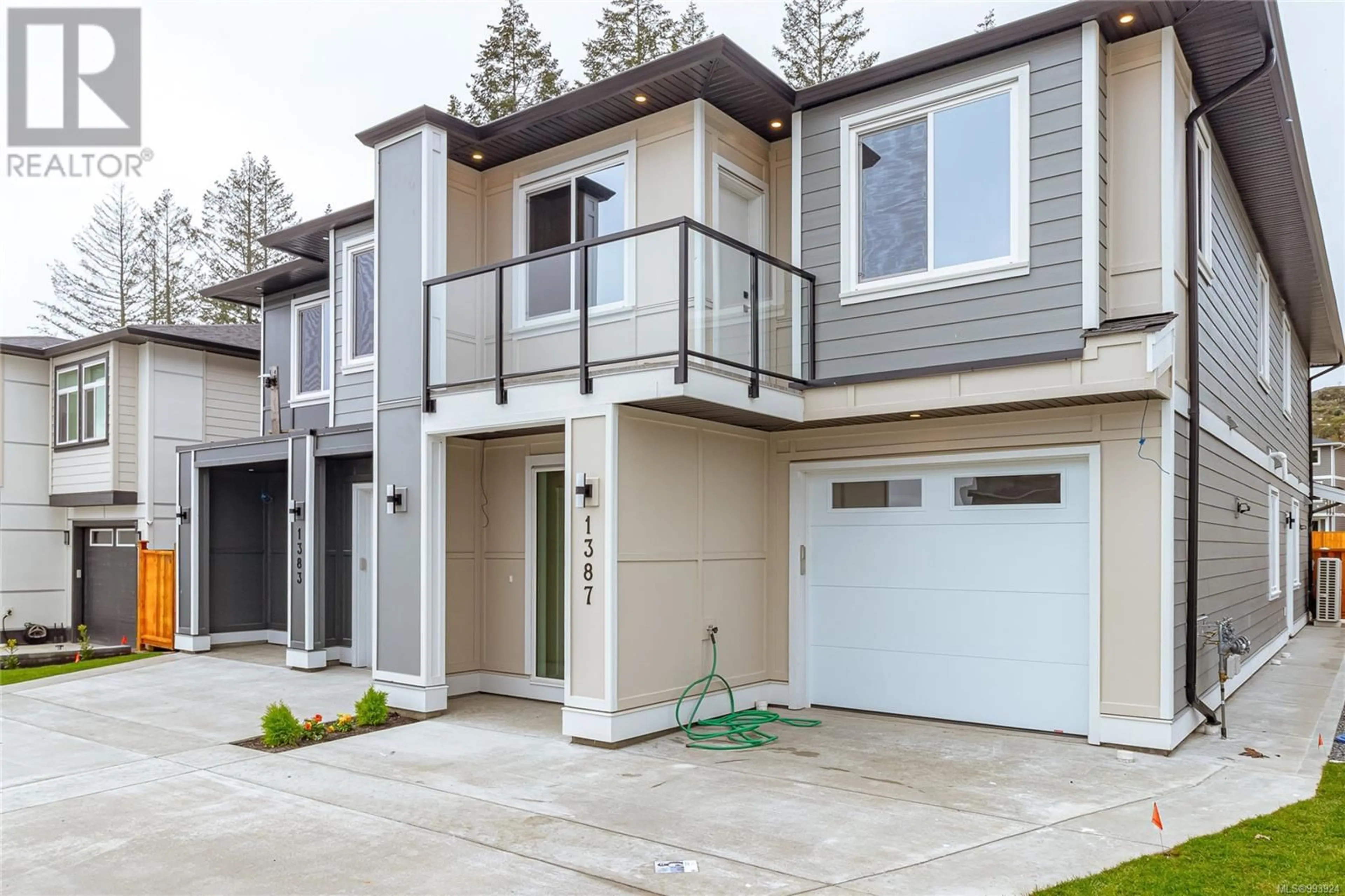 Home with vinyl exterior material, street for 1387 SANDSTONE LANE, Langford British Columbia V9B7A2