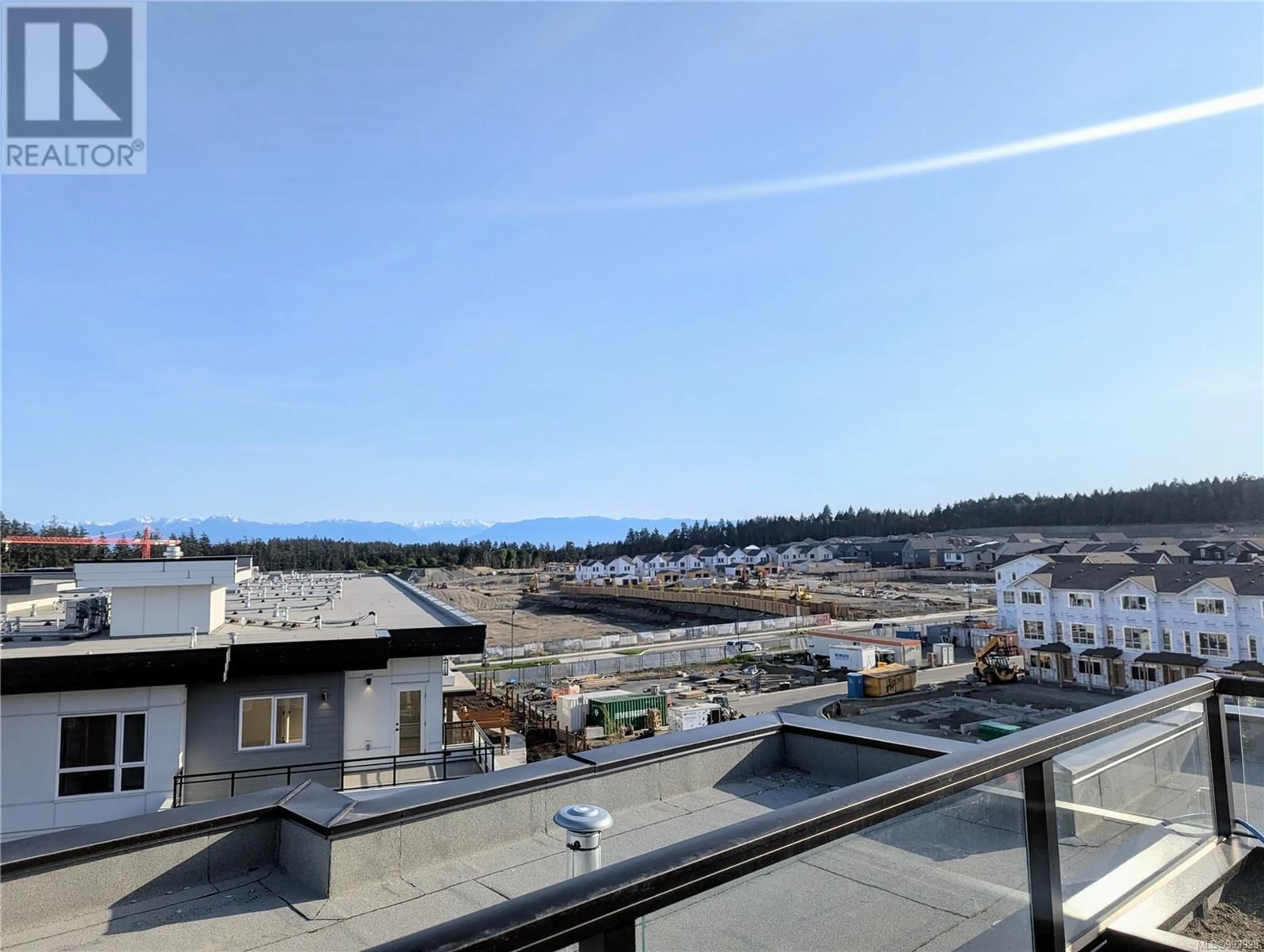 Balcony in the apartment, city buildings view from balcony for 408 - 3564A RYDER HESJEDAL WAY, Colwood British Columbia V9C0V3