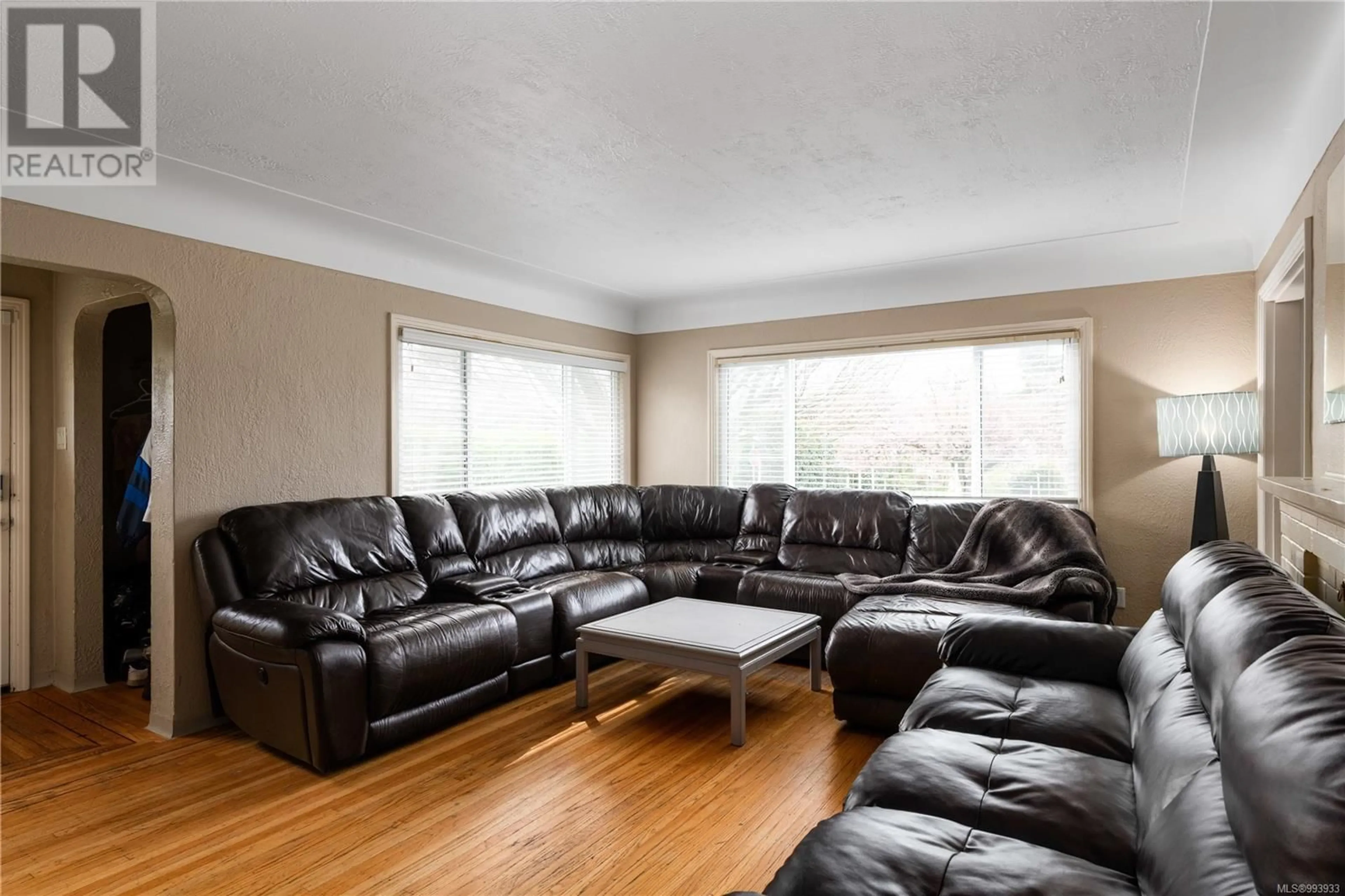 Living room with furniture, wood/laminate floor for 1130 Finlayson St, Victoria British Columbia V8T2V1