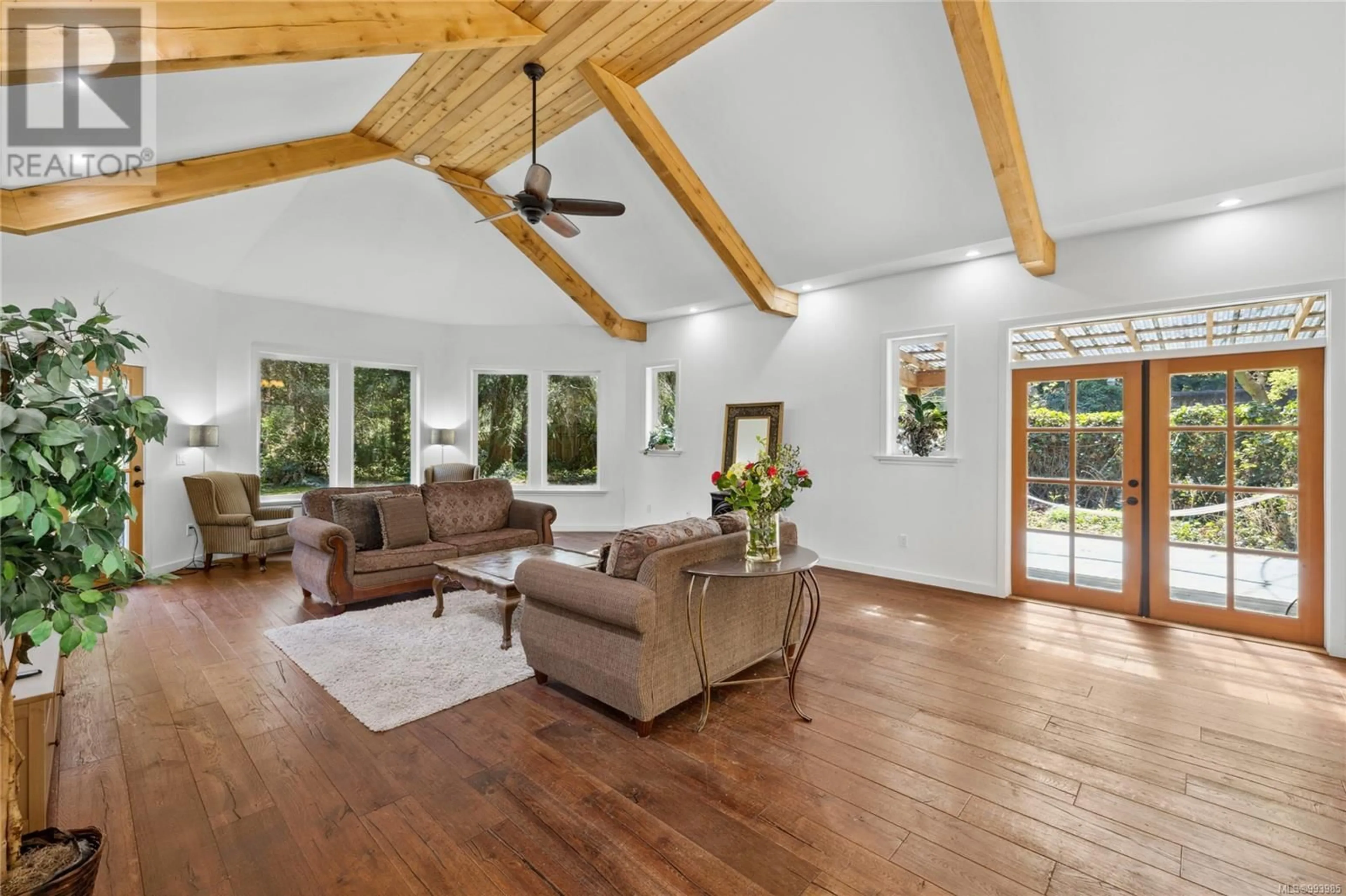 Living room with furniture, wood/laminate floor for 594 WAIN ROAD, Parksville British Columbia V9P1R8