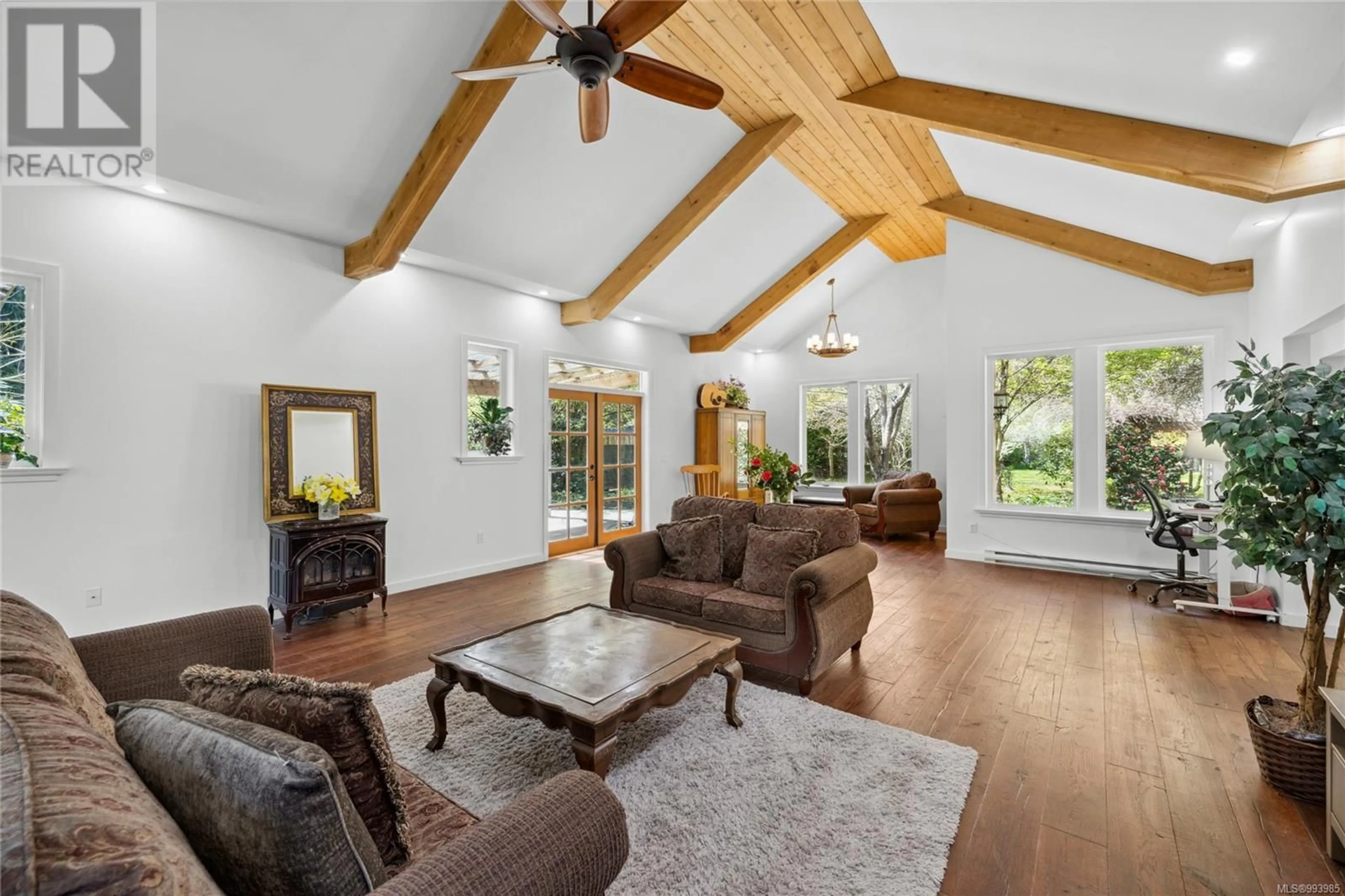 Living room with furniture, wood/laminate floor for 594 WAIN ROAD, Parksville British Columbia V9P1R8