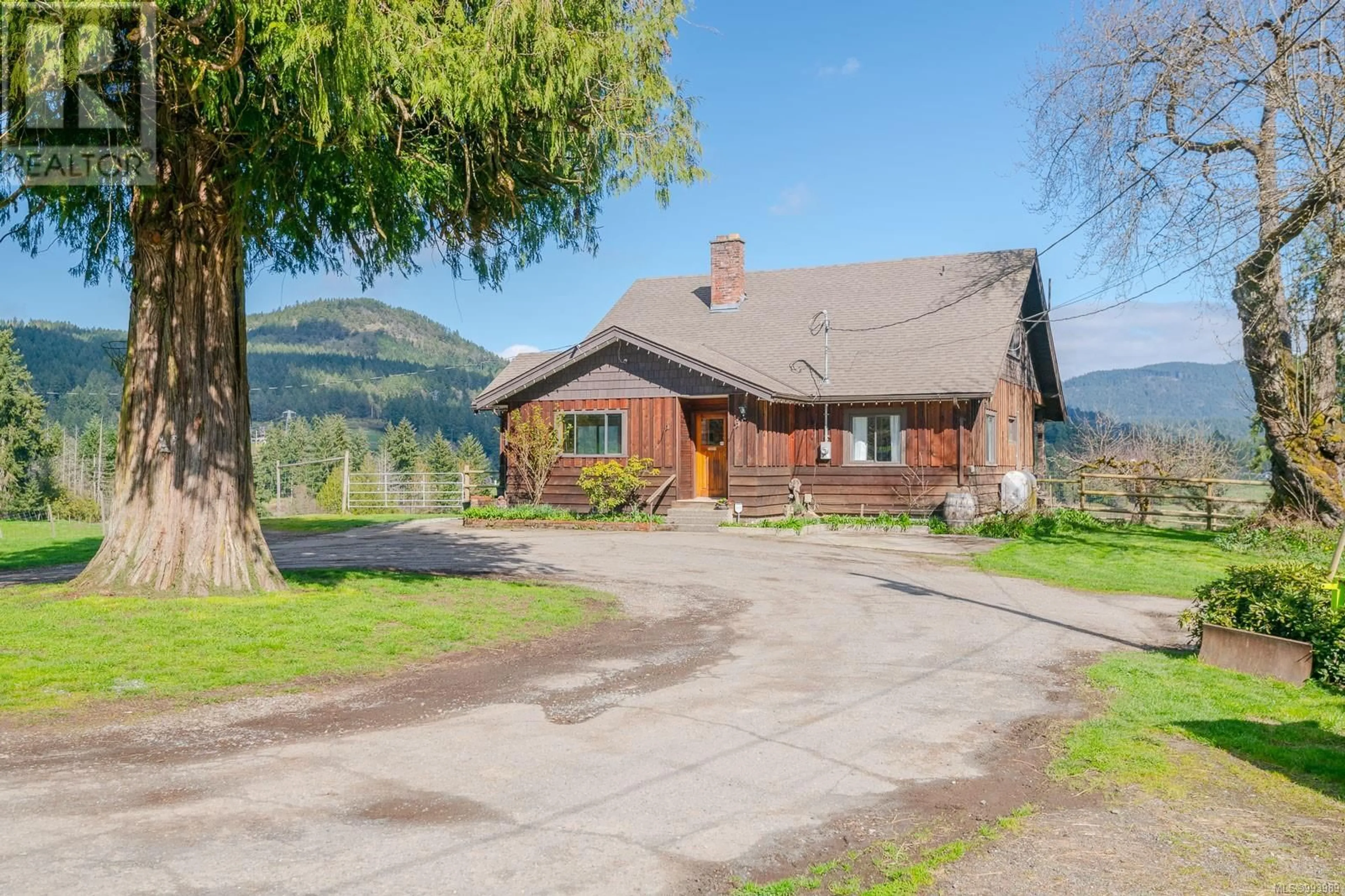 A pic from outside/outdoor area/front of a property/back of a property/a pic from drone, mountain view for 7087 MAYS ROAD, Duncan British Columbia V9L6A6