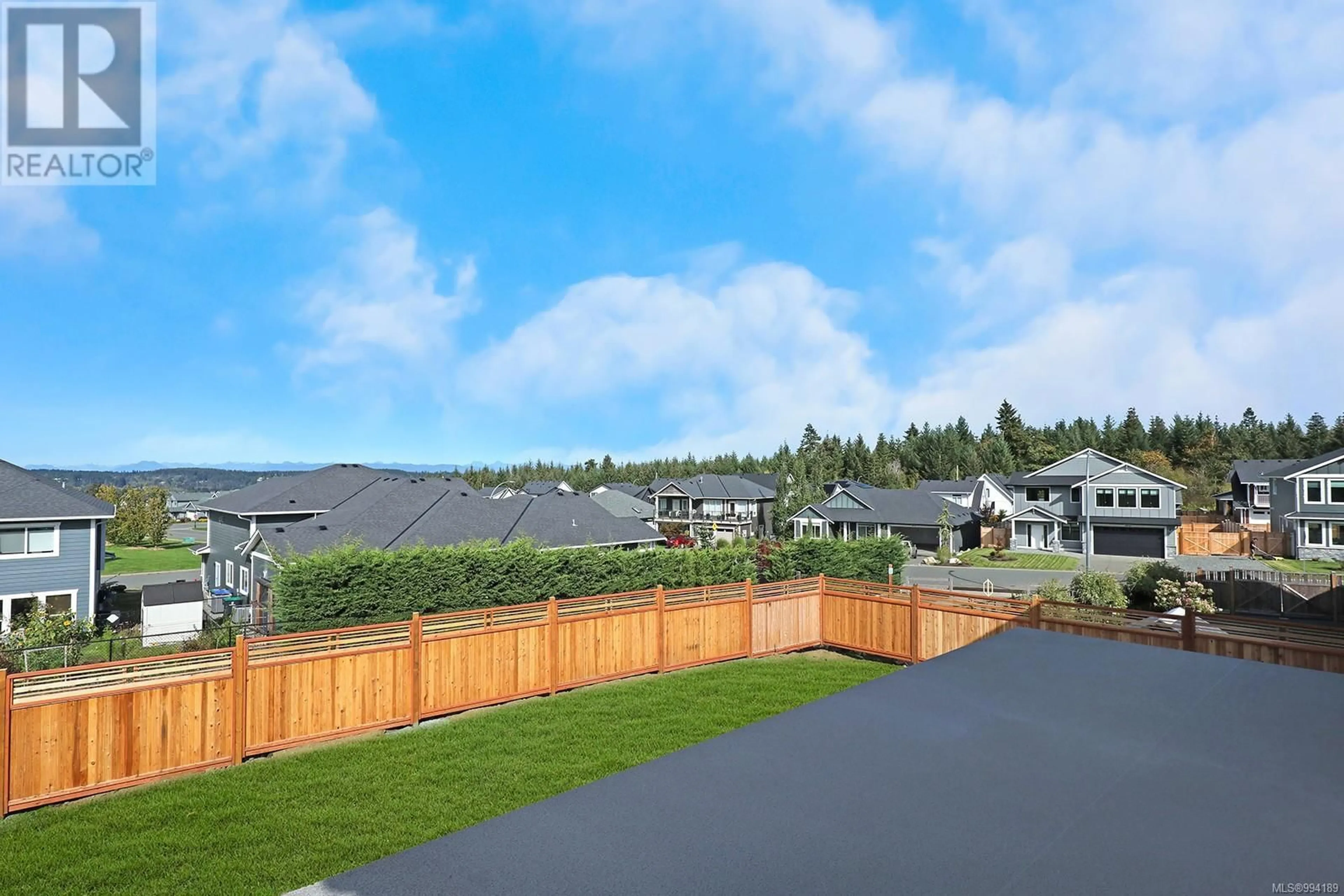 A pic from outside/outdoor area/front of a property/back of a property/a pic from drone, mountain view for 3287 Eagleview Cres, Courtenay British Columbia V9B0B6