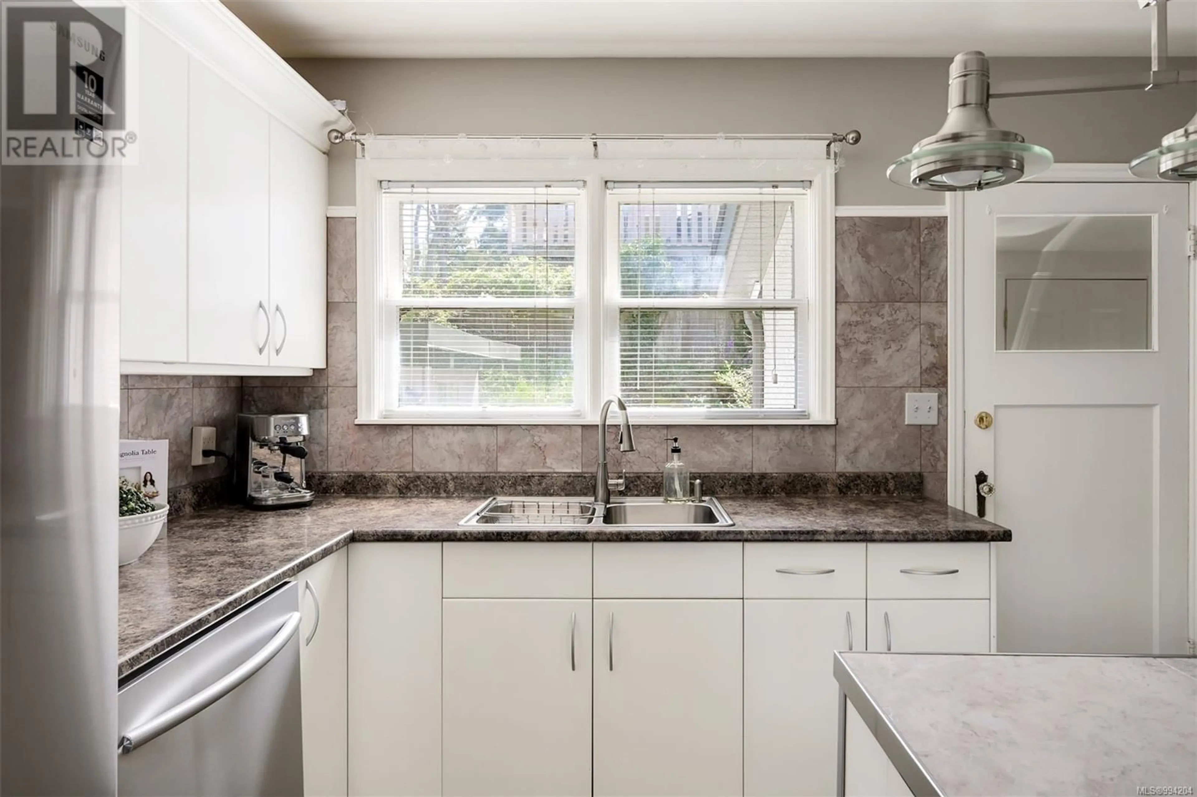 Standard kitchen, ceramic/tile floor for 1151 REYNOLDS ROAD, Saanich British Columbia V8P2K5
