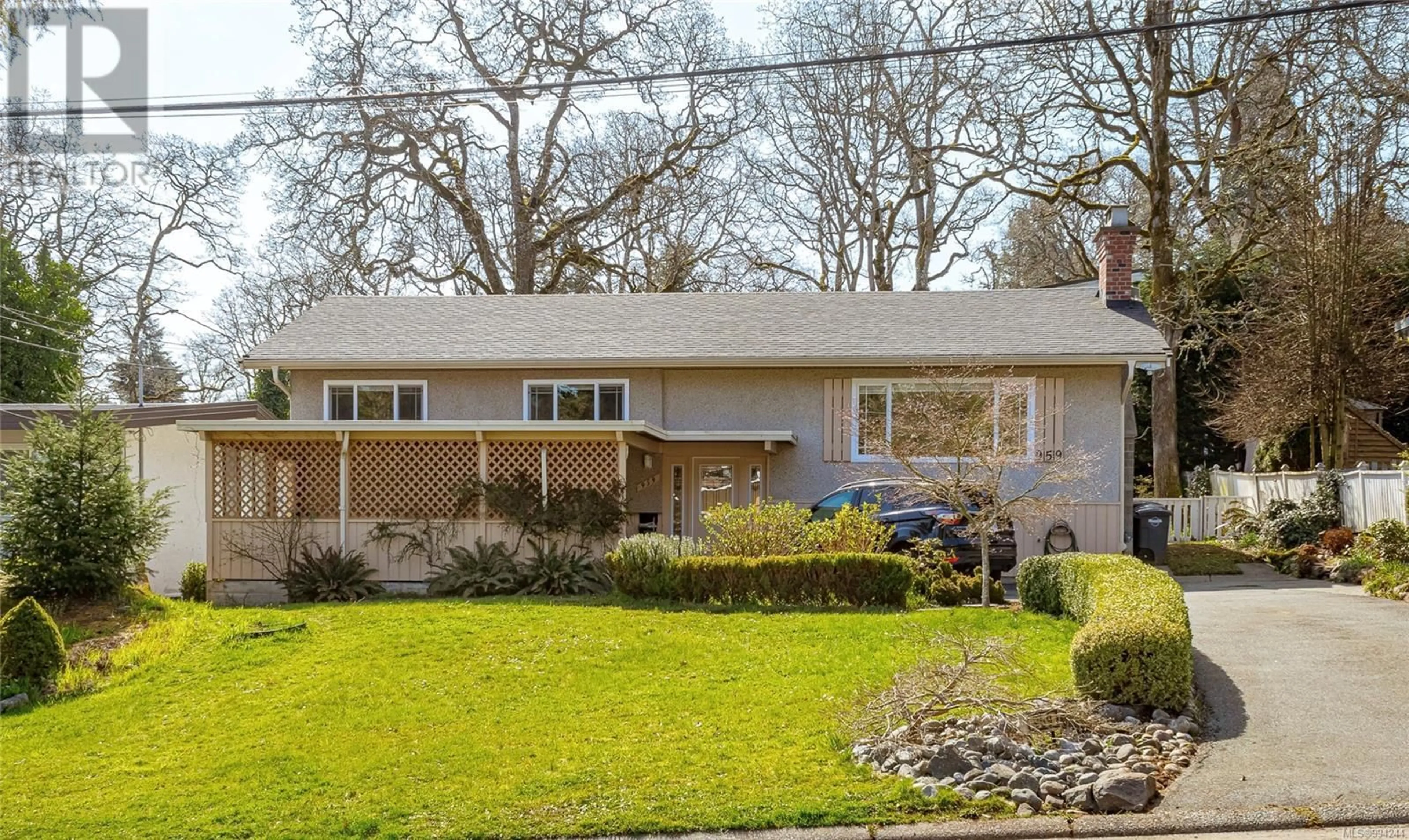 Home with vinyl exterior material, street for 959 WOODHALL DRIVE, Saanich British Columbia V8X3L7